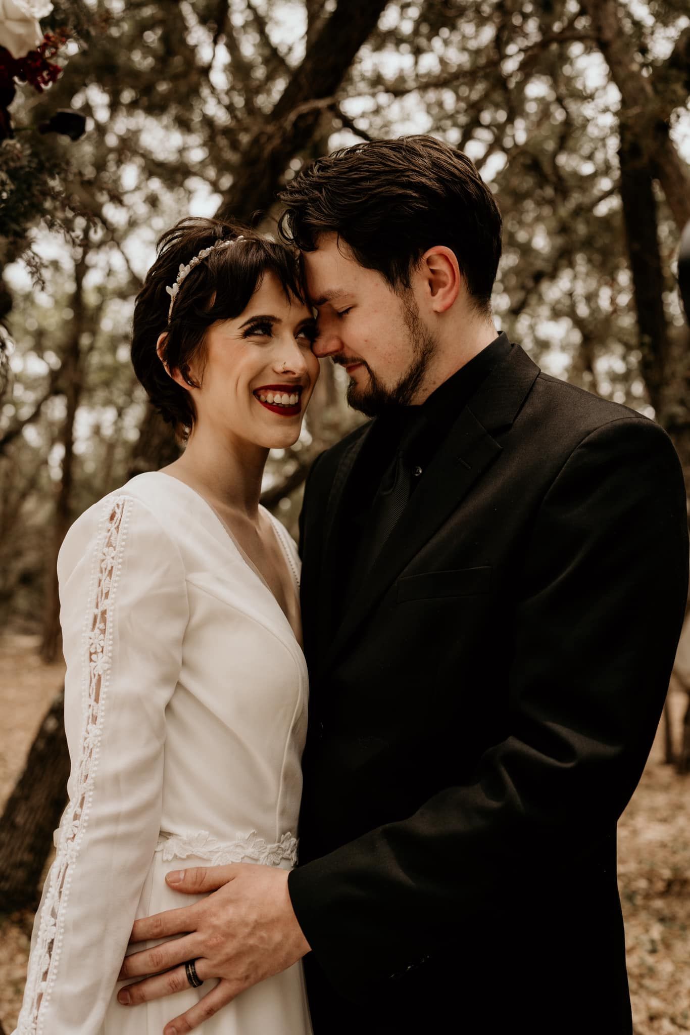 An intimate moment captured in warm tones showing affection and laughter.