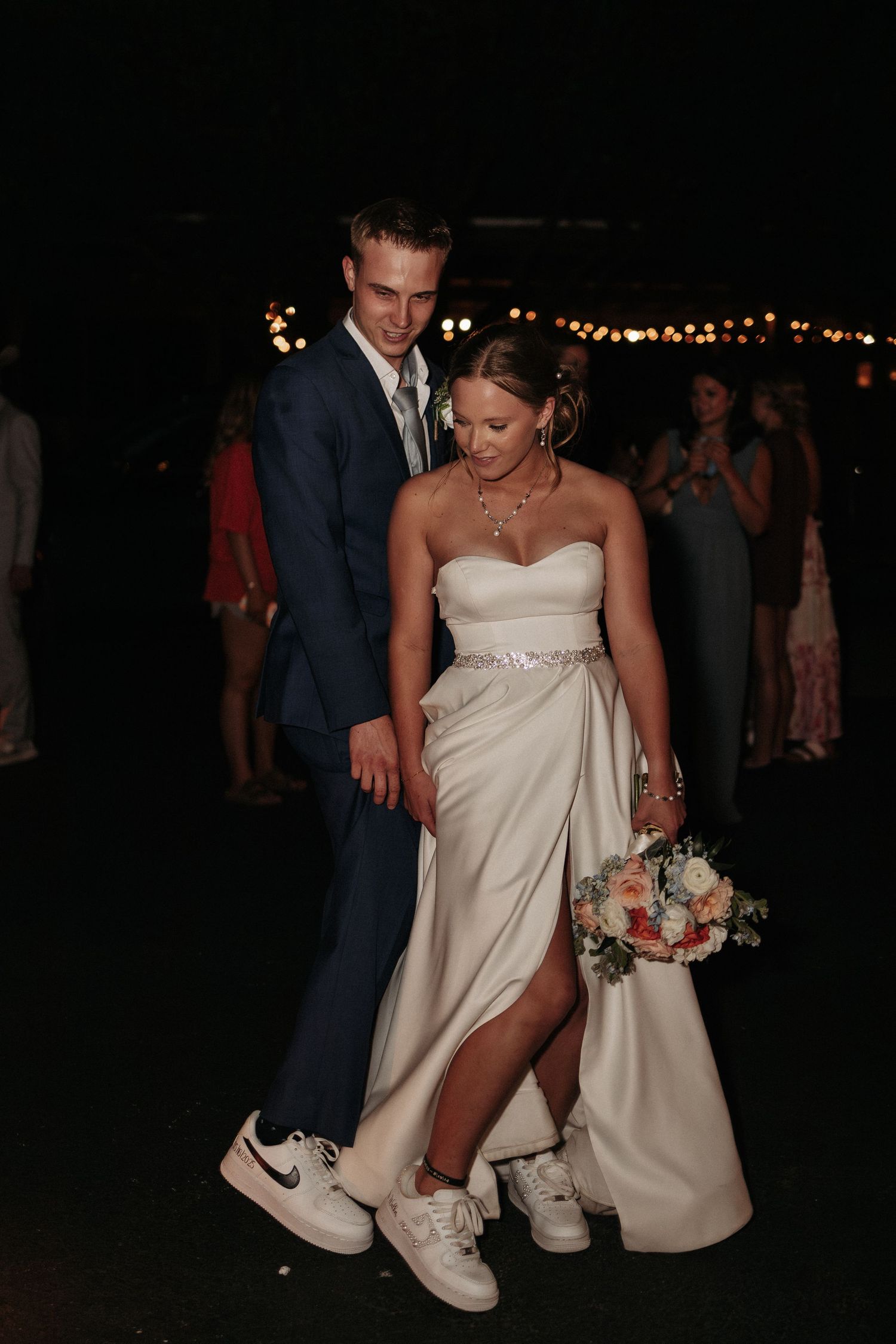 Bride and groom candid at departure in Fort Worth, Texas, captured by Nichols Photography wedding photographer with warm, candid style.