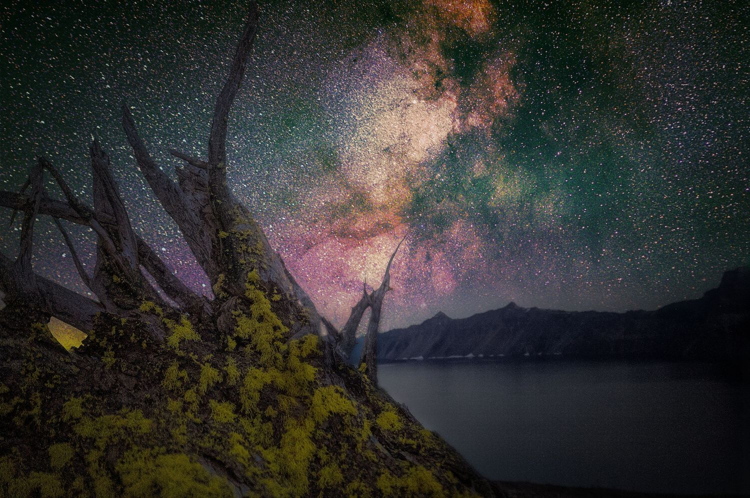 Panoramic night sky photography showing the Milky Way galaxy over mountain landscapes.