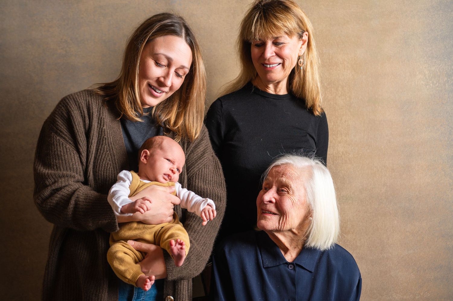 A series of candid family portraits showing joyful moments and laughter against a neutral backdrop.
