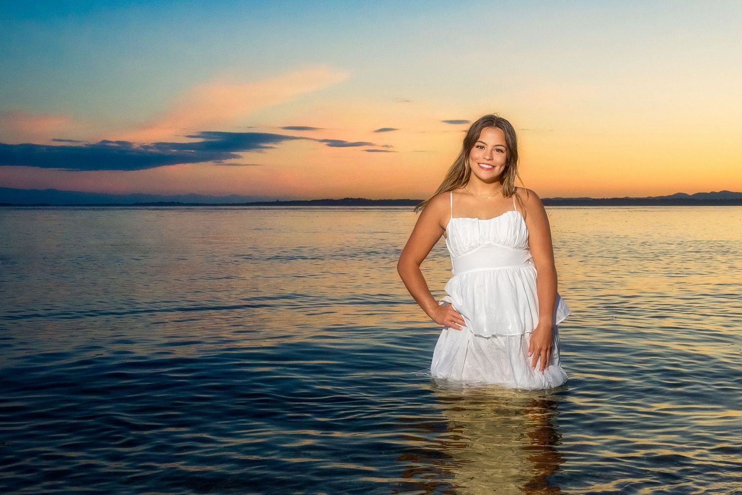 A series of sunset beach portraits showing a figure in white standing in calm ocean waters during golden hour.