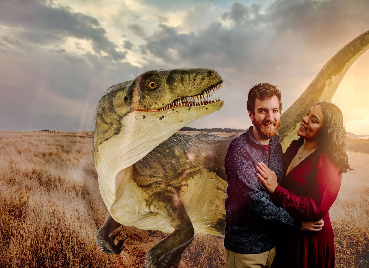 Humorous engagement photo with velociraptor dinosaur in prairie setting at sunset.