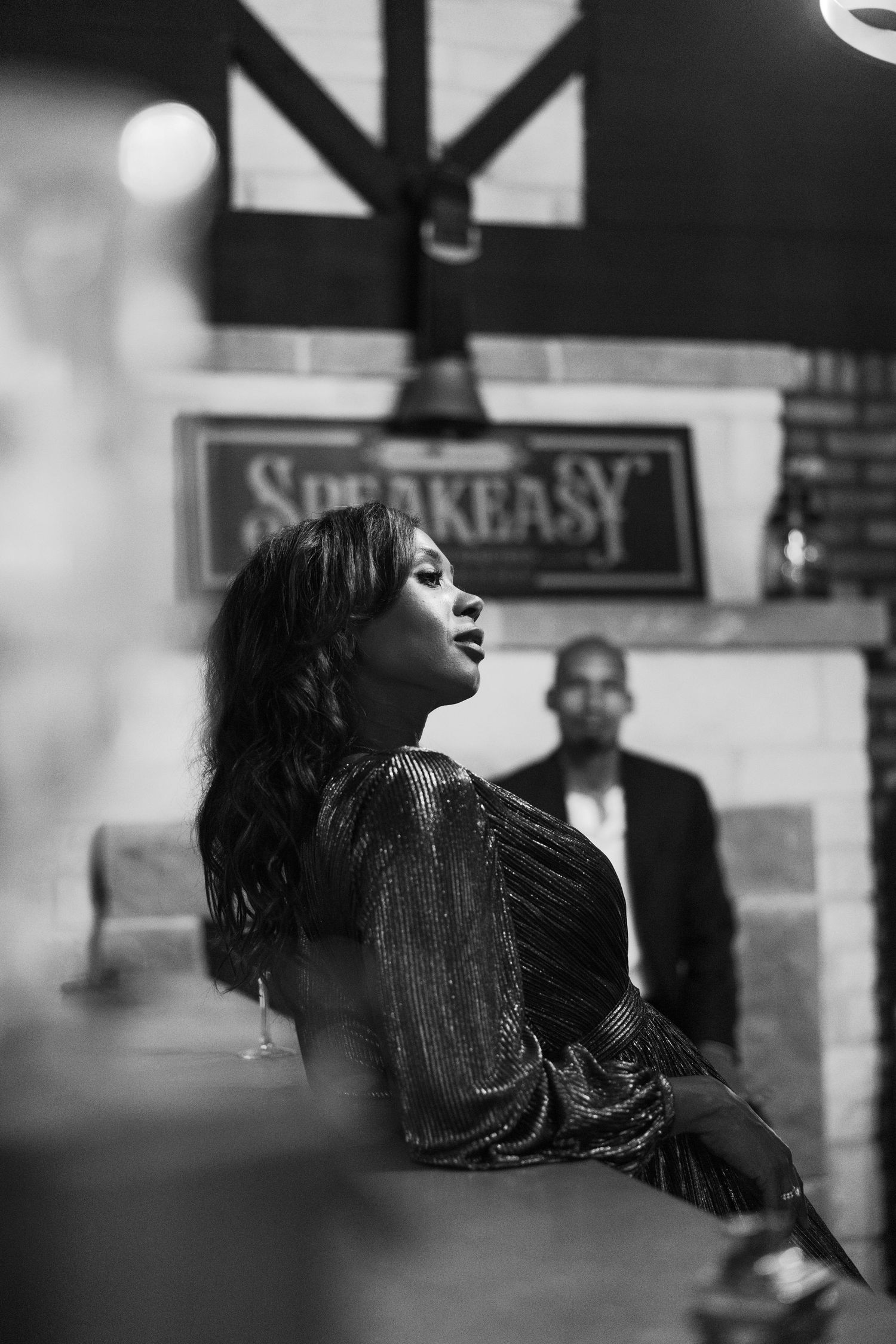 Artistic black and white profile shots showing hair movement and dramatic lighting.