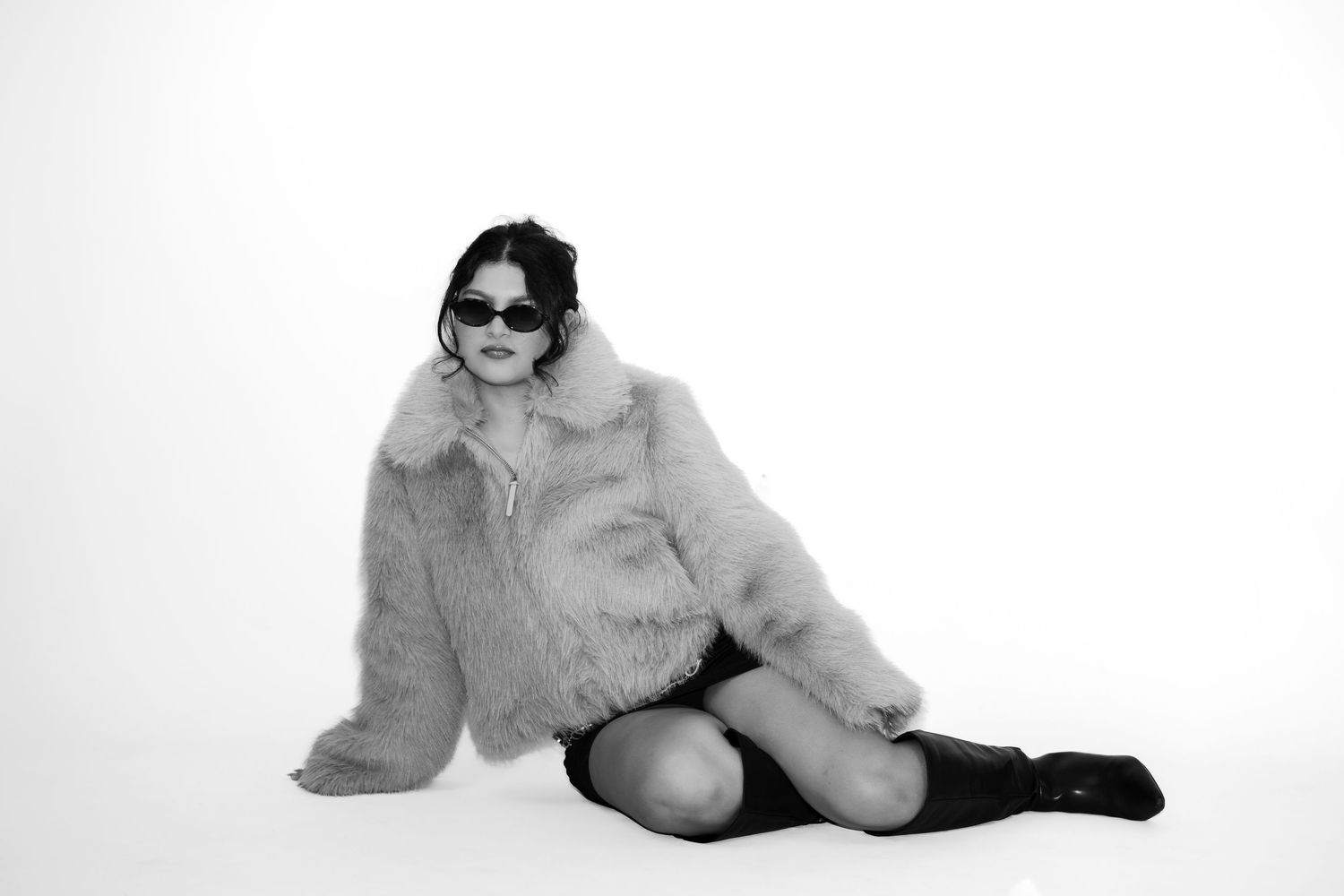Artistic black and white fashion poses with fur jacket.