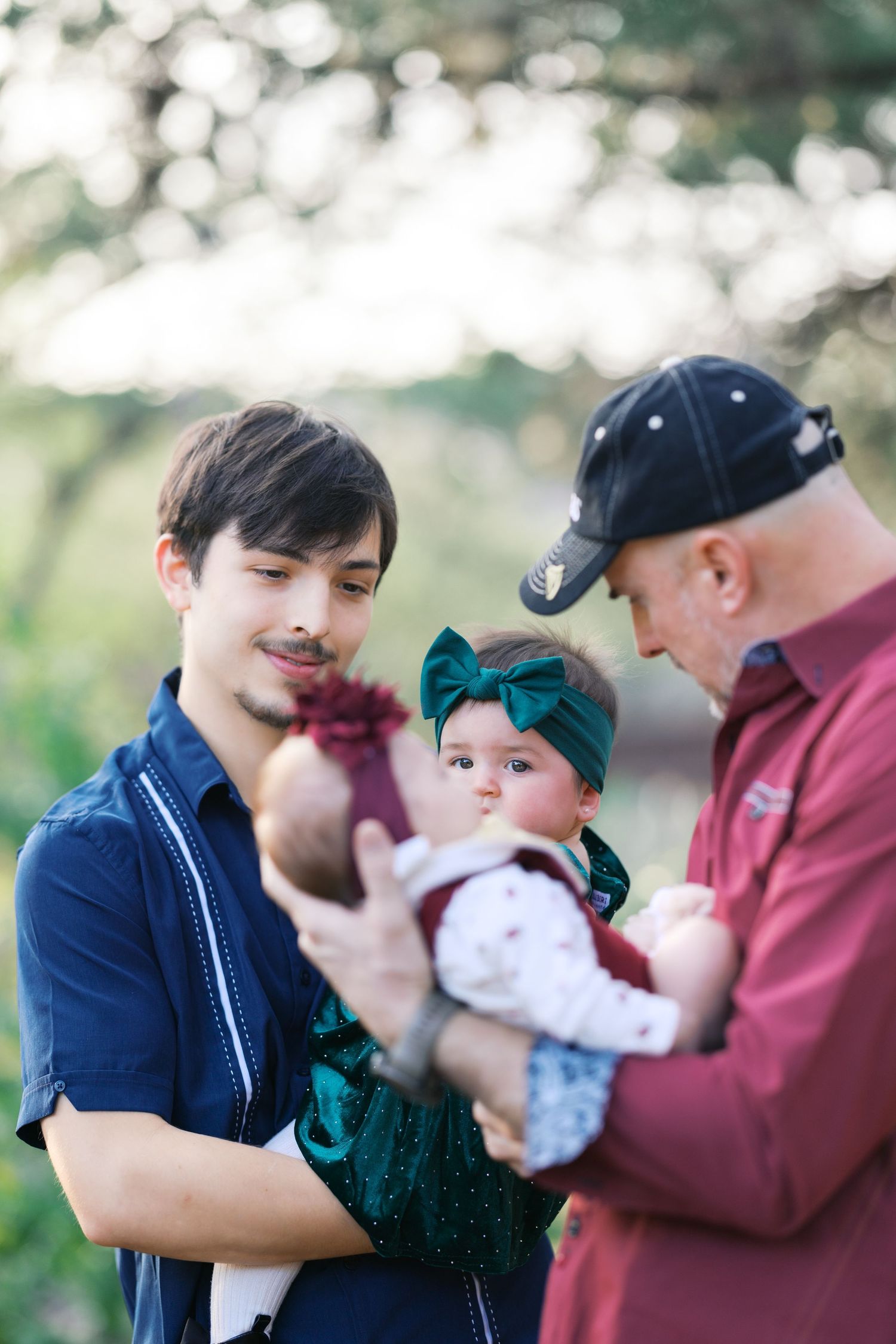 Group photo session showing tender moments between family members.