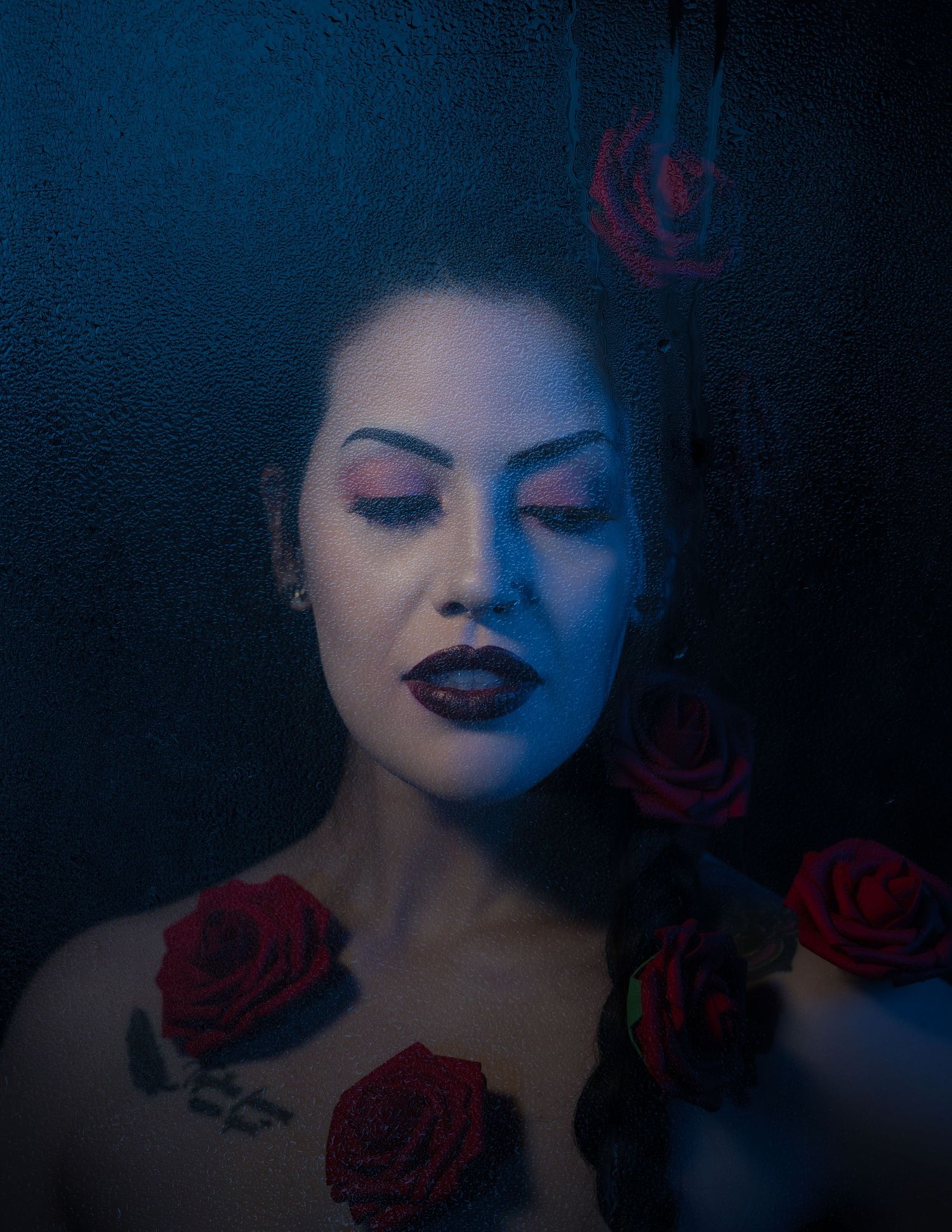 A moody, creative portrait of a model with a gothic aesthetic, cinematic effects and dramatic lighting.