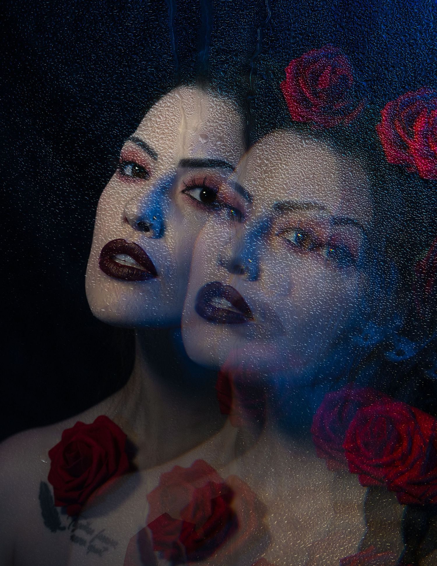 A moody, creative portrait of a model with a gothic aesthetic, cinematic effects and dramatic lighting.