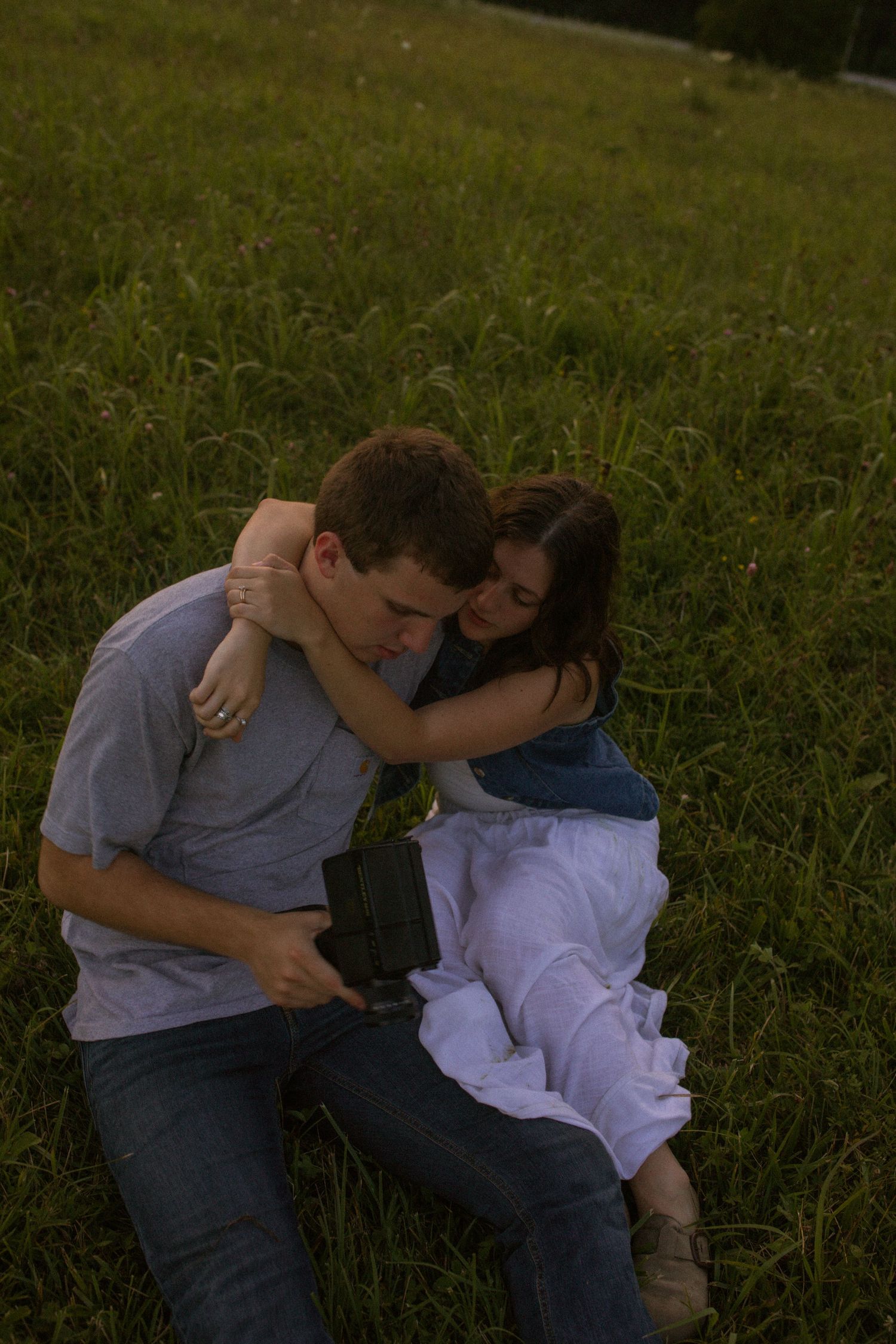 couple embraces during blue hour