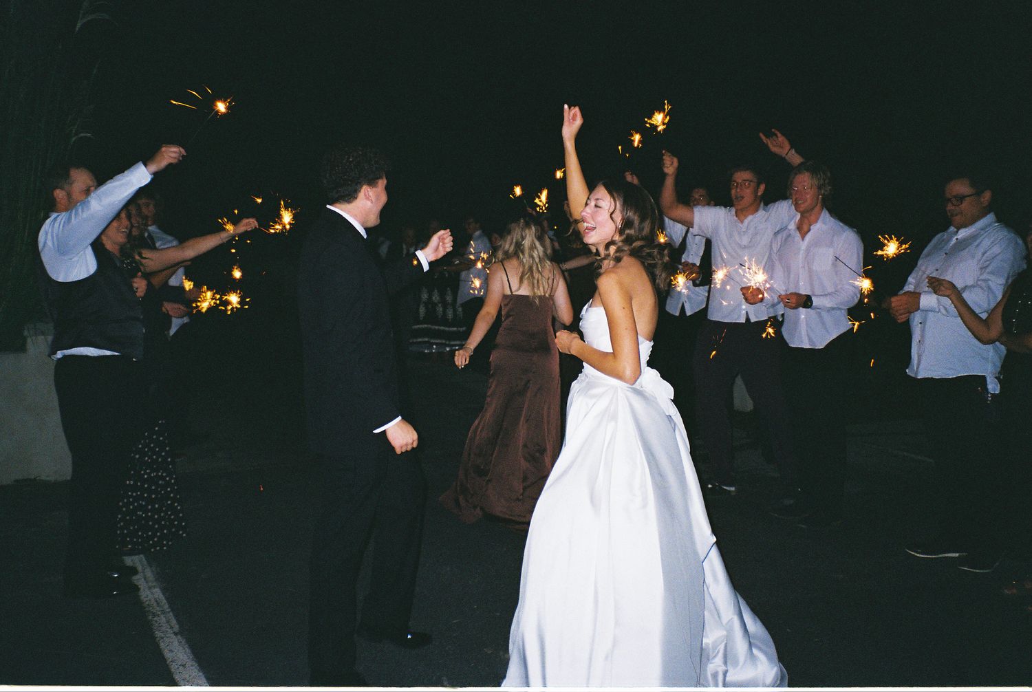 utah couple celebrates during reception photographed on flash 35mm film