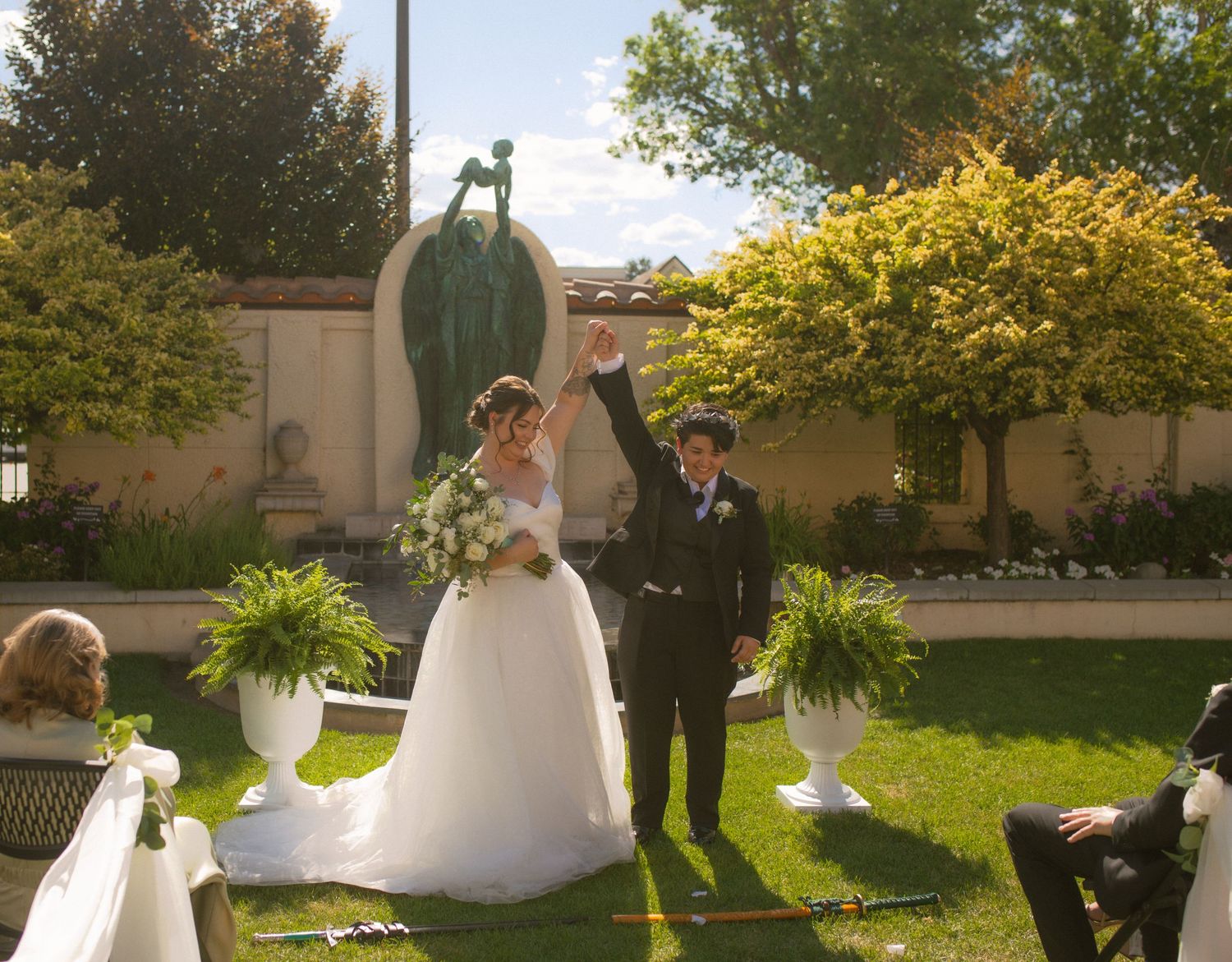 two women celebrate moments after their wedding ceremony in utah