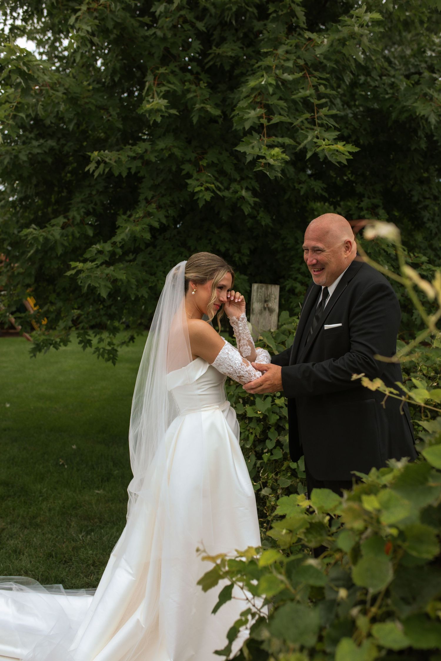 bride cries during first look with her father