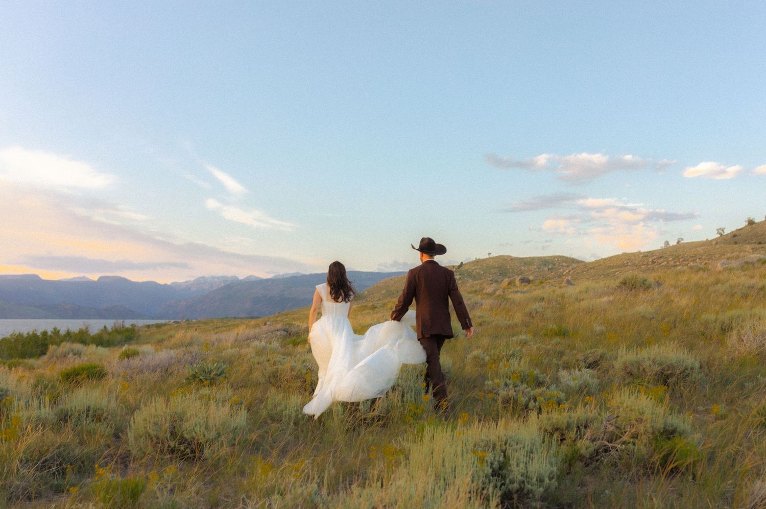 wyoming wedding couple exploring during sunset near grand tetons