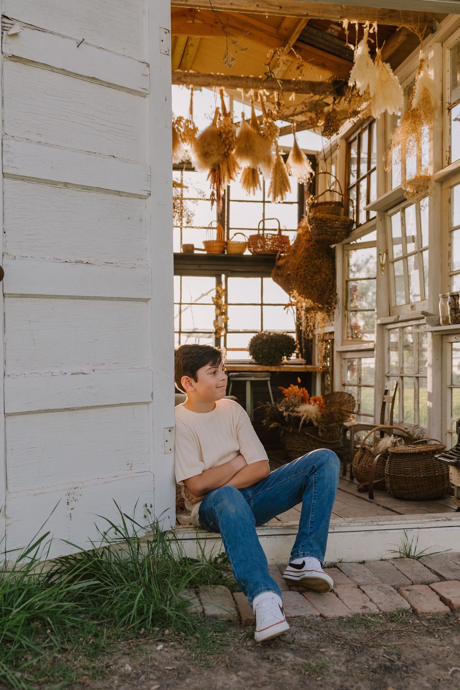 lifestyle family session at golden hour at the Glass Shack in Howe, TX