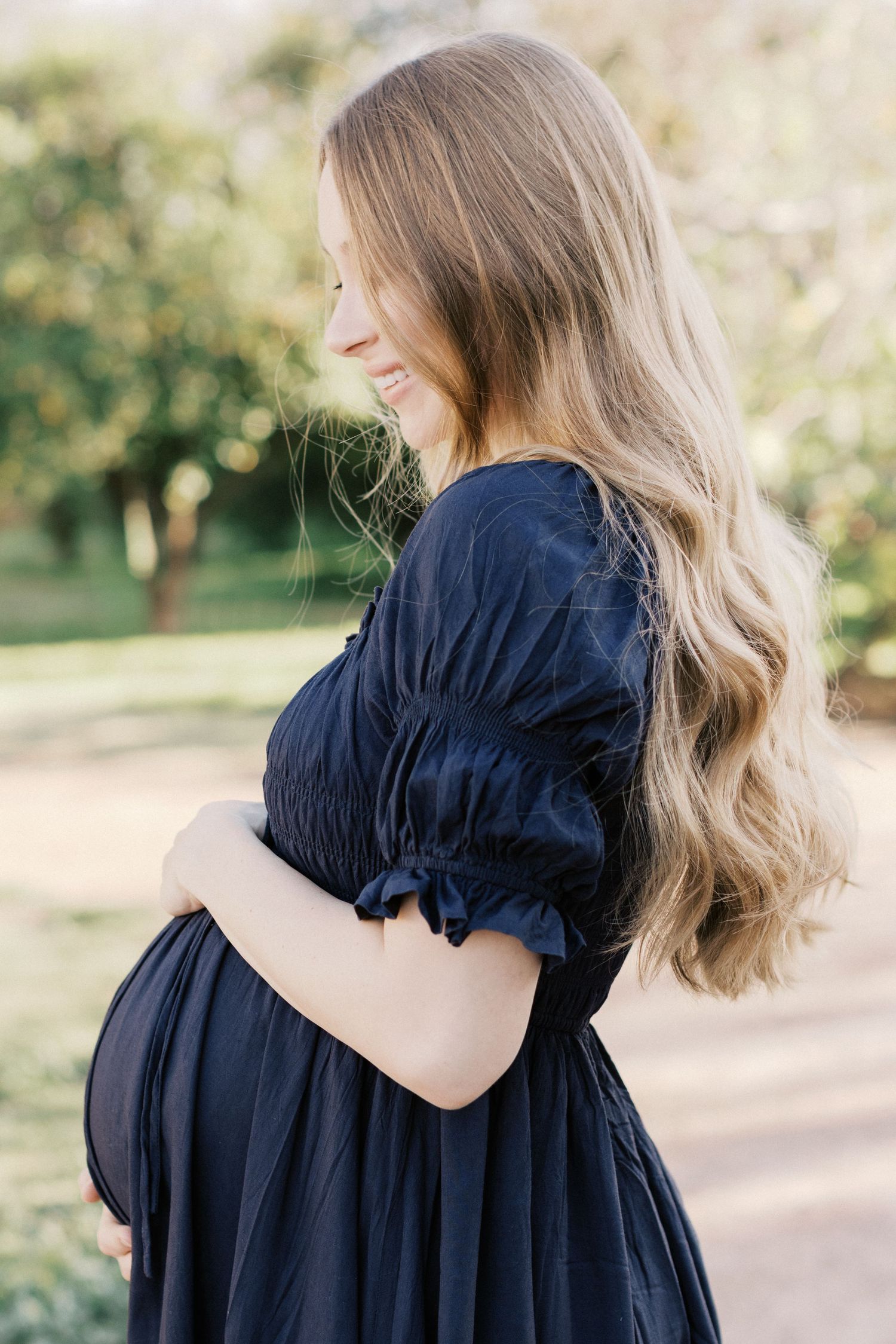 North Phoenix maternity photography capturing timeless, classic, and organic family moments during a heartfelt maternity session.
