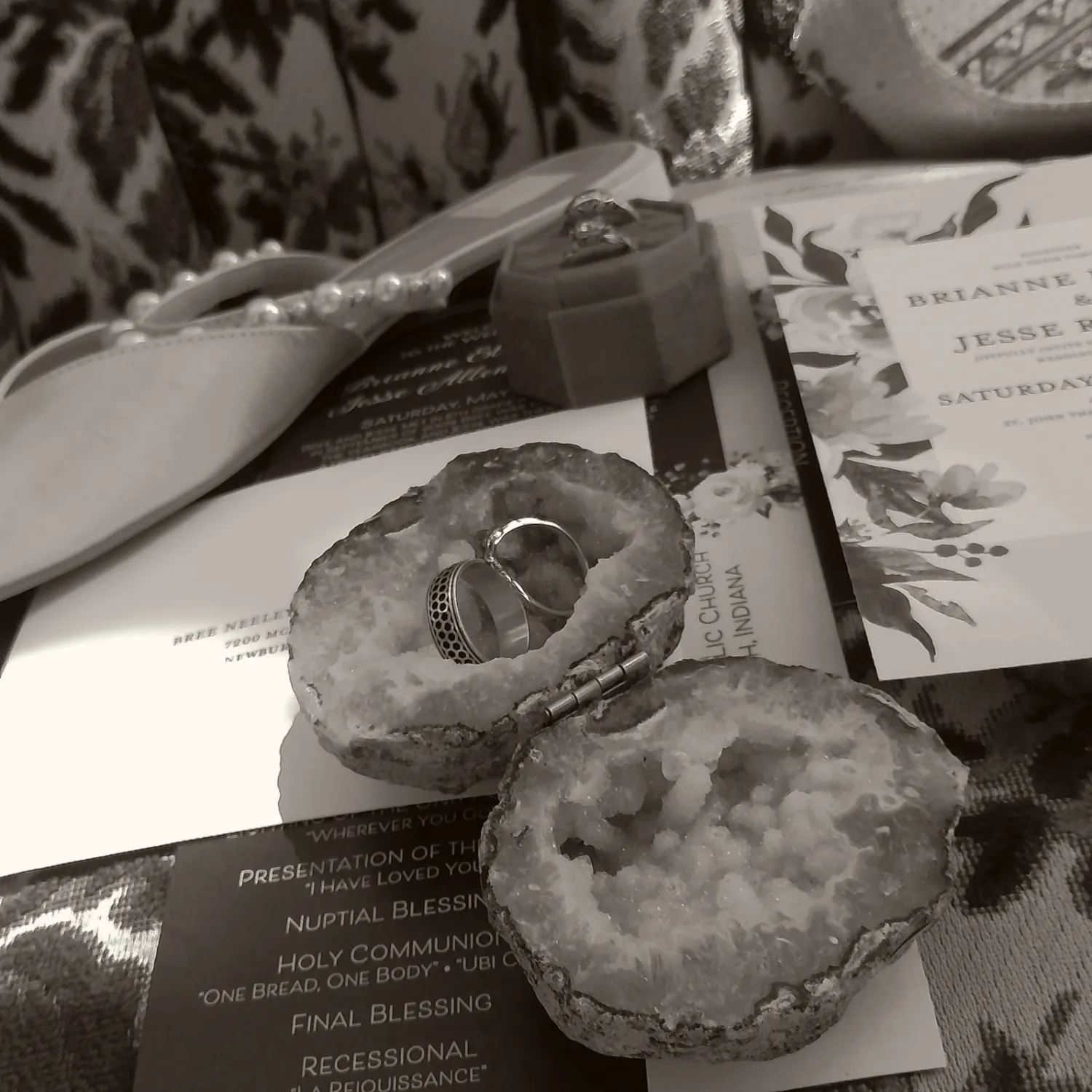 Black and white photo series showing donuts on plates with text documents in a formal dining setting.