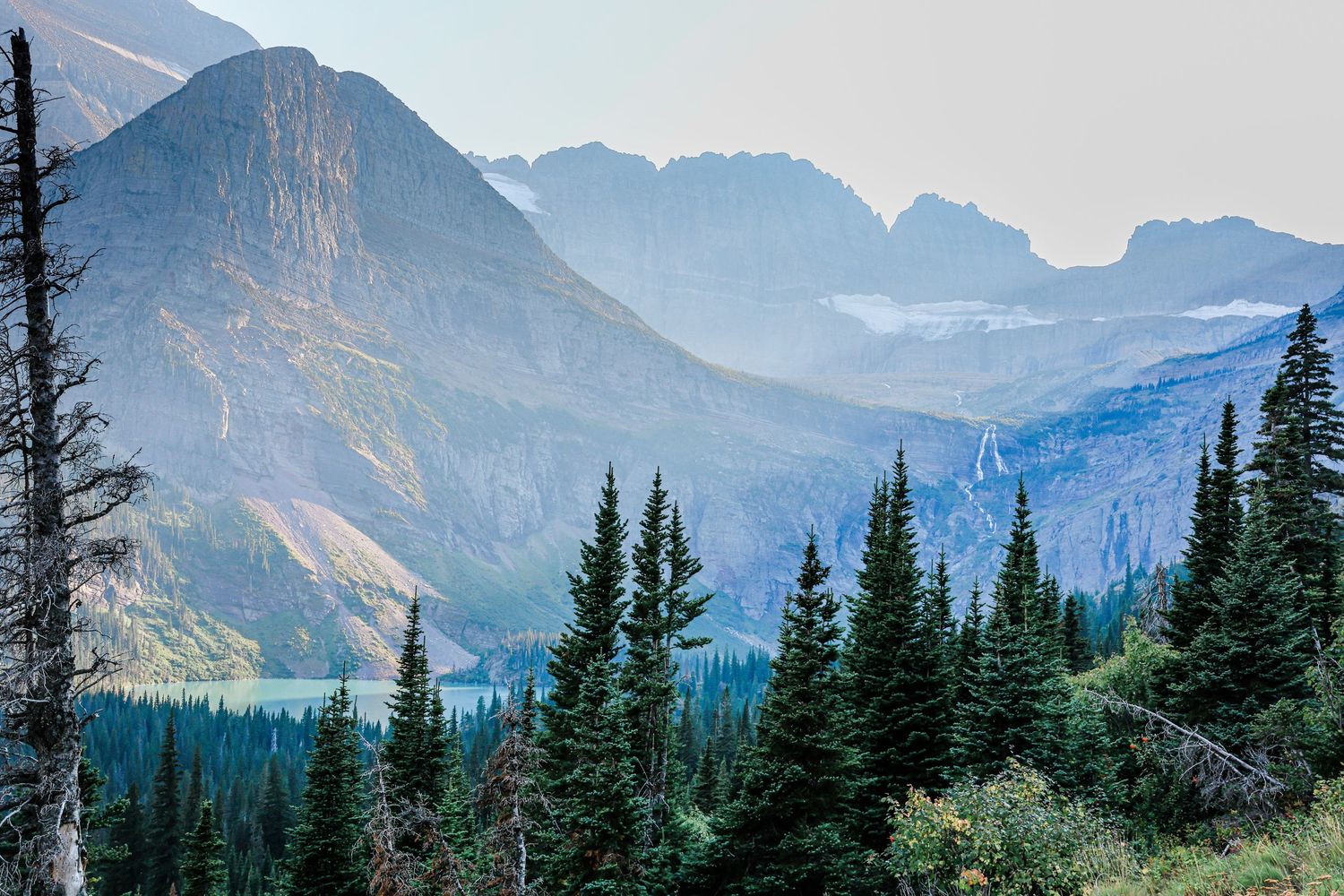 Epic Mountain Adventure Elopement photography backdrop featuring towering, layered peaks. Destination and US travel photographer.