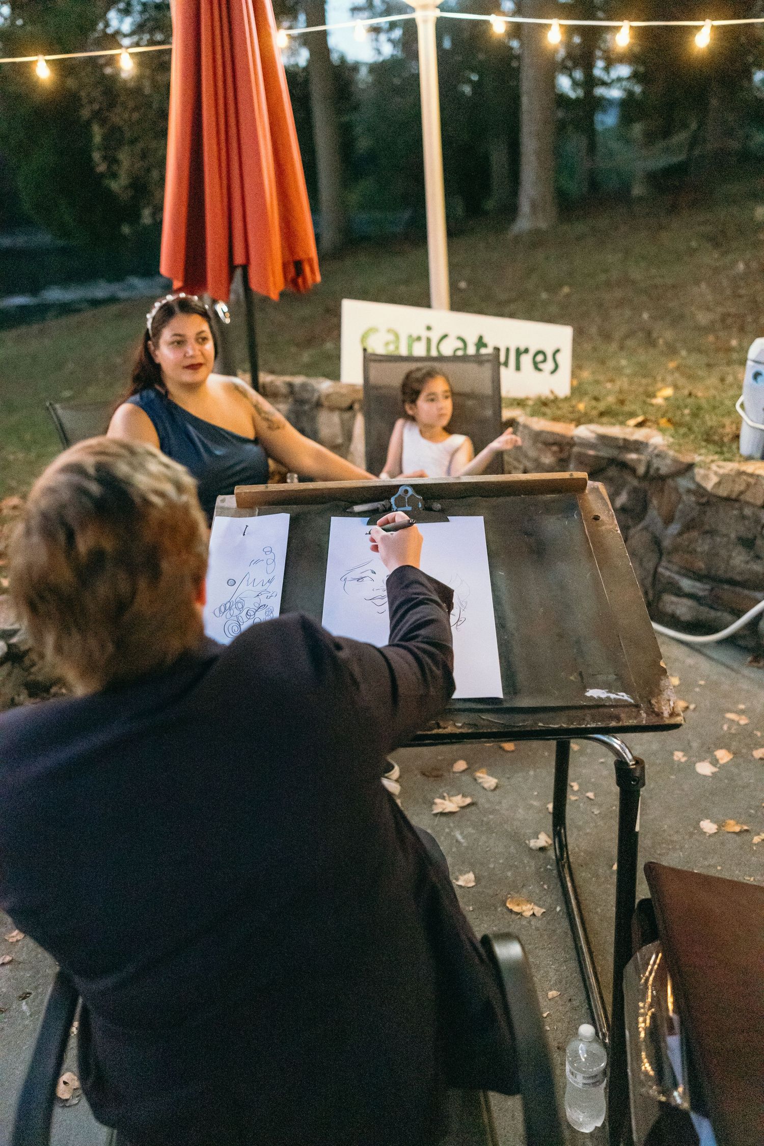 Candid Documentary wedding photo during an intimate outdoor reception.