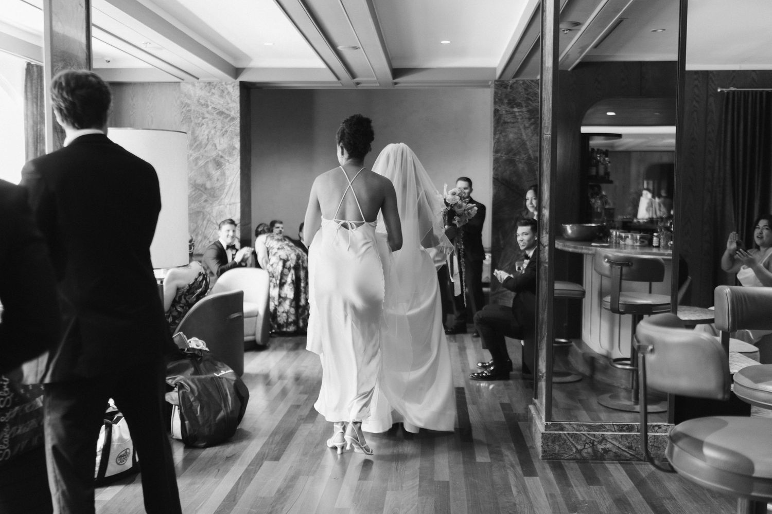 Black and white interior shots showing wedding day preparations.