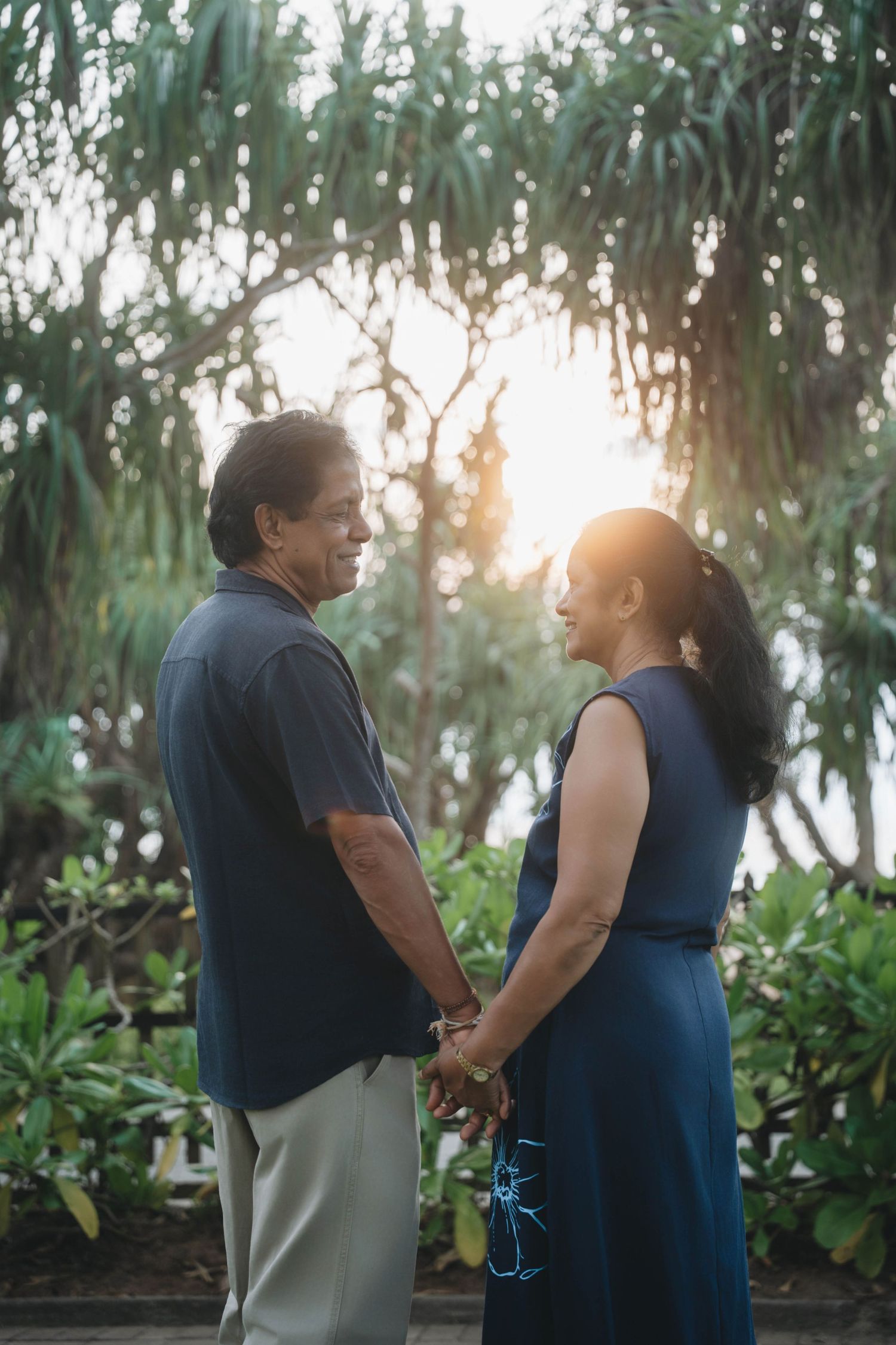 Elderly couple portrait on a tropical island in Sri Lanka during outdoor photography session.