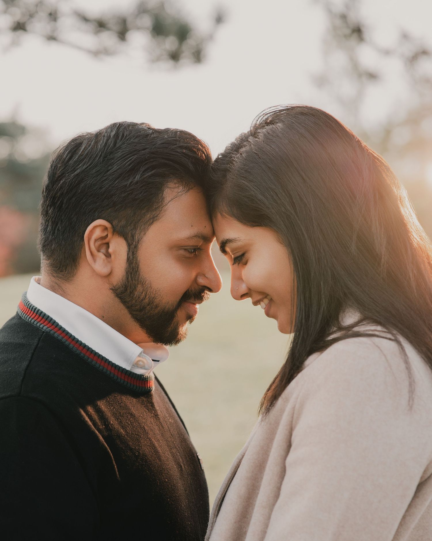 Couple holding hands during outdoor engagement session in Mississauga