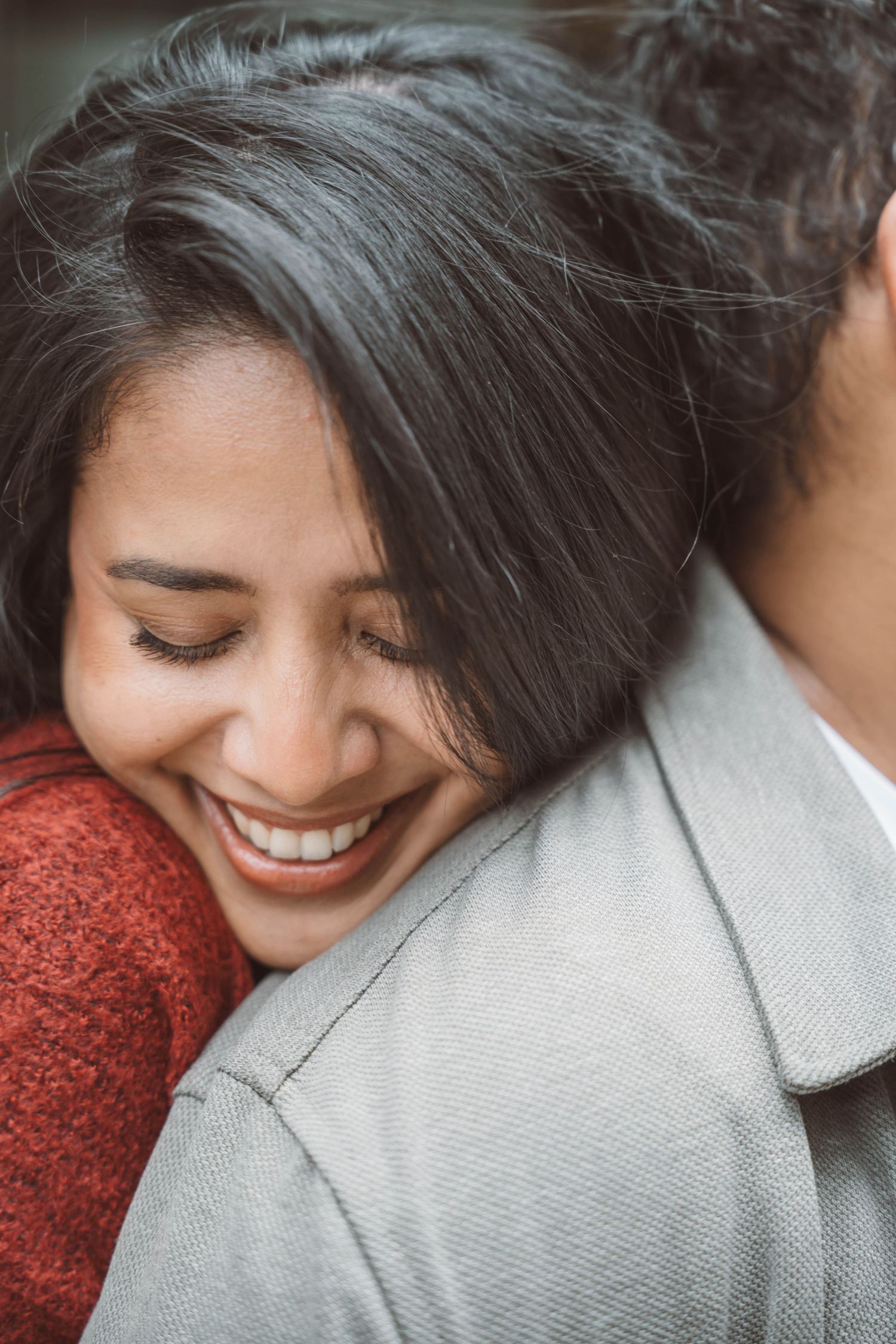 Couple holding hands during outdoor engagement session in Toronto