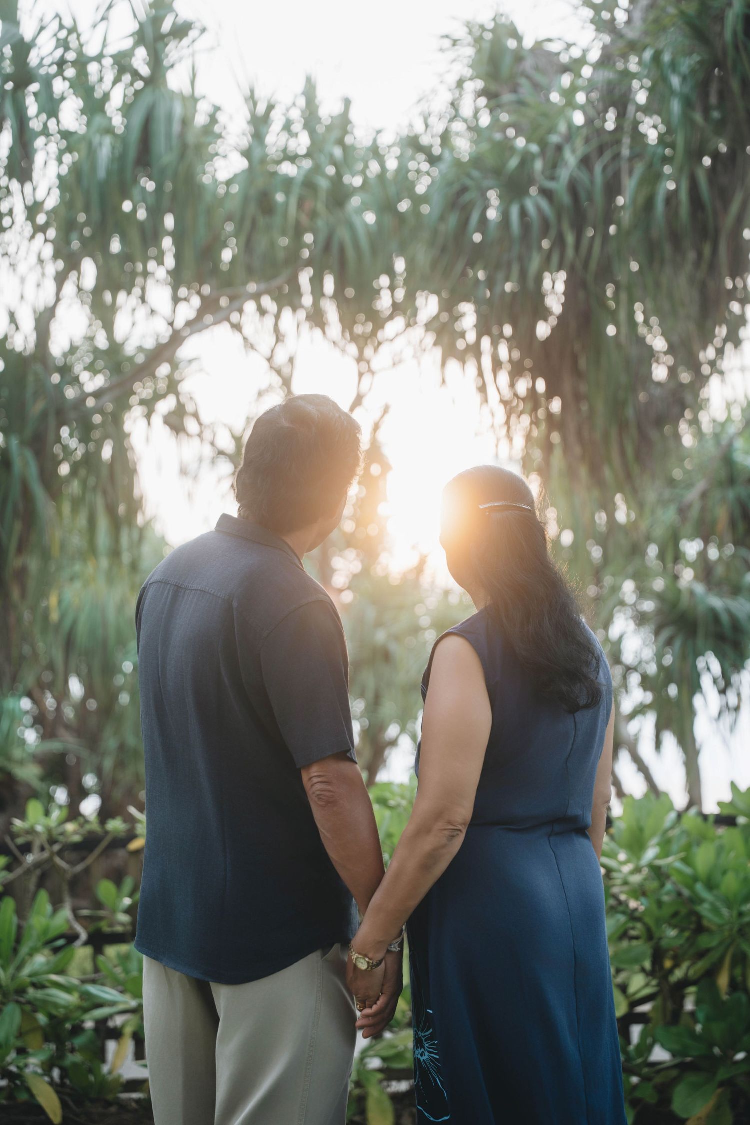 Elderly couple portrait on a tropical island in Sri Lanka during outdoor photography session.