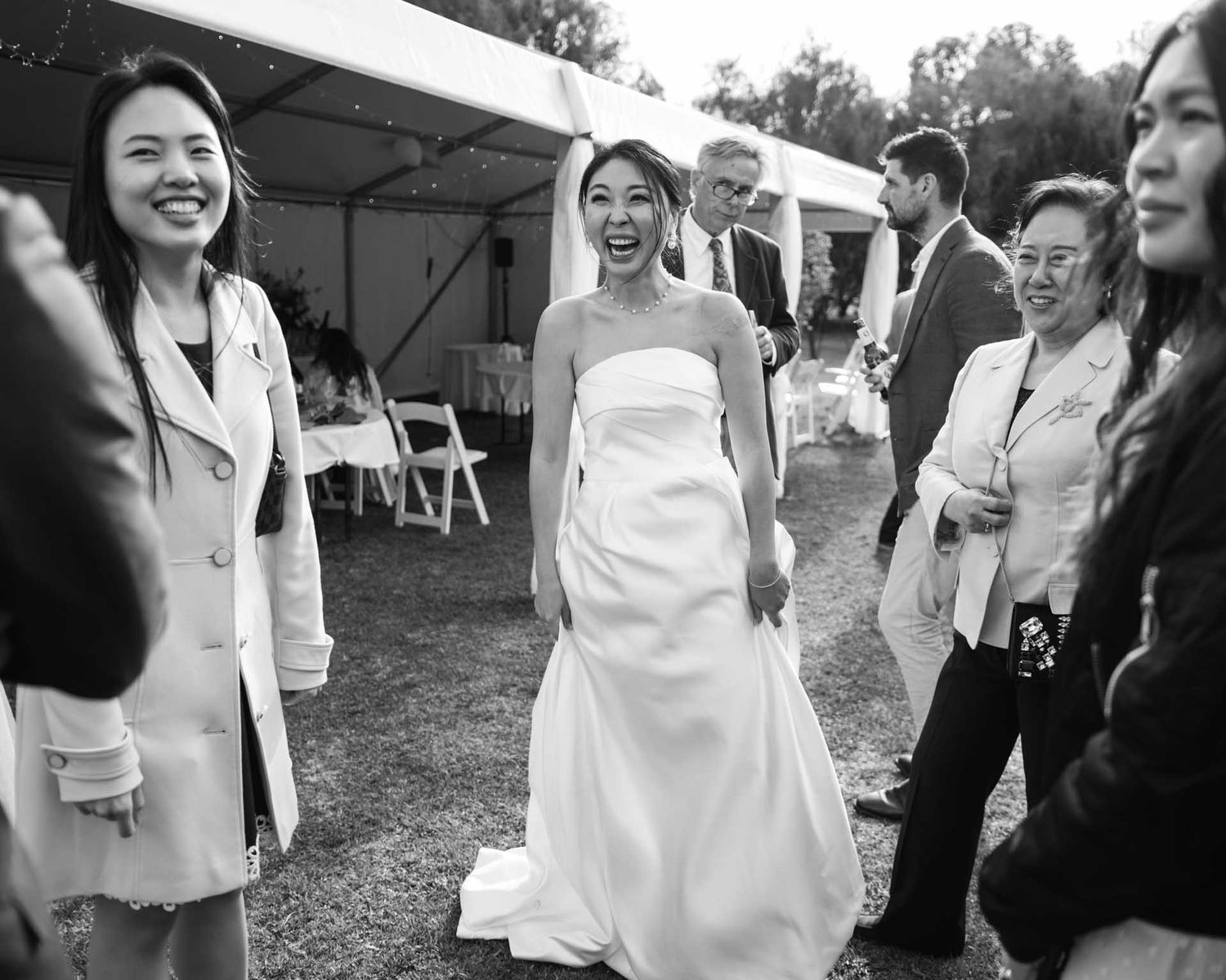 Bride laughing with guests after her wedding in Tanunda, captured by Barossa Valley wedding photographer Matt Webster