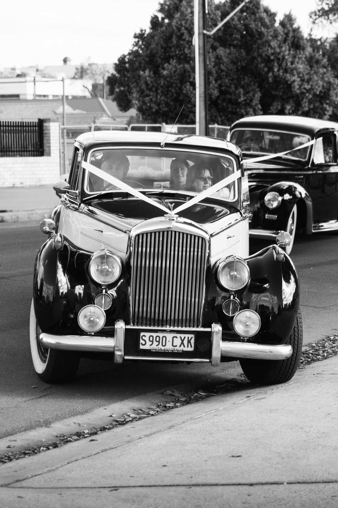 A Bentley wedding car at St George Orthodox Church, Thebarton, SA, photographed by Barossa Valley wedding photographer Matt Webster.