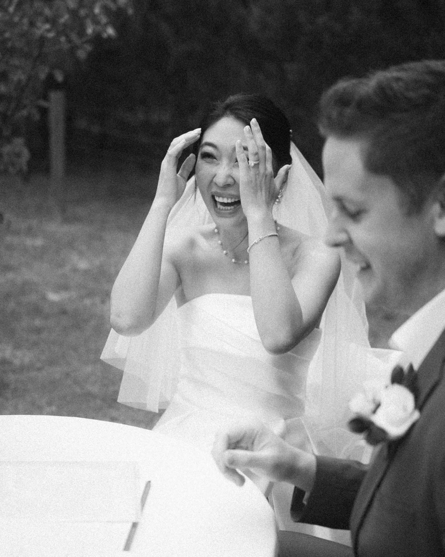 Bride laughing at her wedding in Tanunda, captured by Barossa Valley wedding photographer Matt Webster.
