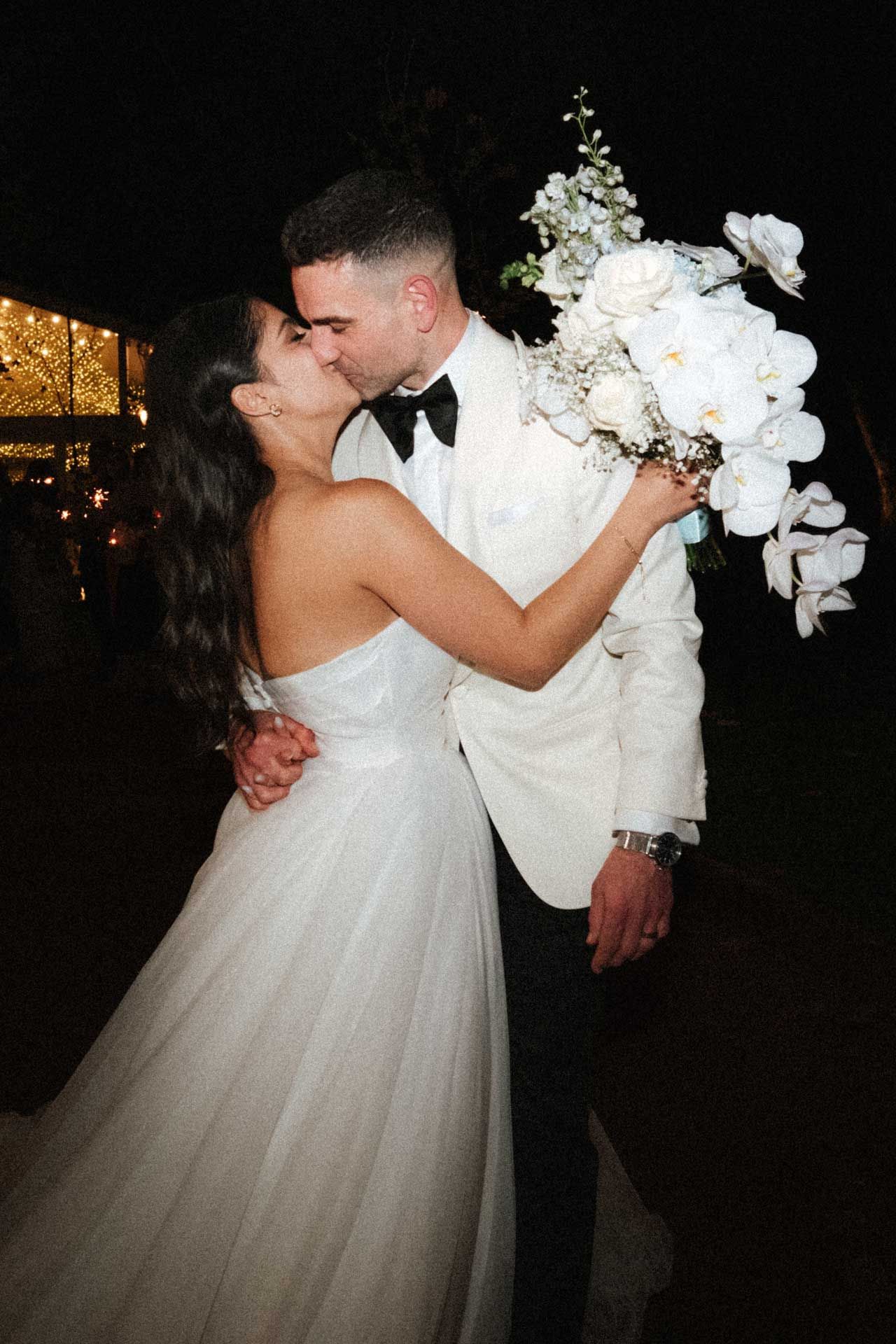Bride and groom kiss after their wedding reception at Sunnybrae Estate, Adelaide, captured by Barossa Valley photographer Matt Webster.