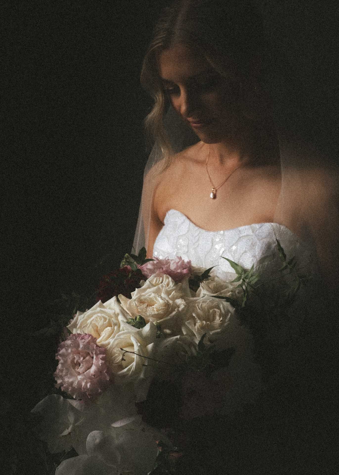 Bride portrait photo with flowers at The Manor, Basket Range, photographed by Barossa Valley wedding photographer Matt Webster.
