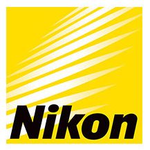 A row of bright yellow Nikon logos arranged horizontally showing the brand's evolution over time.