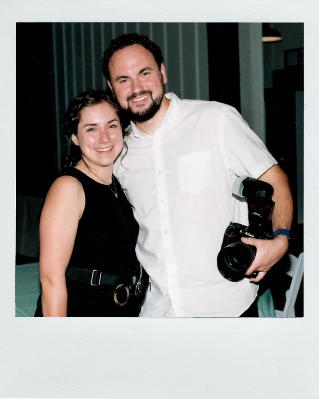 Two people pose together with cameras in a series of candid shots against a dark background.