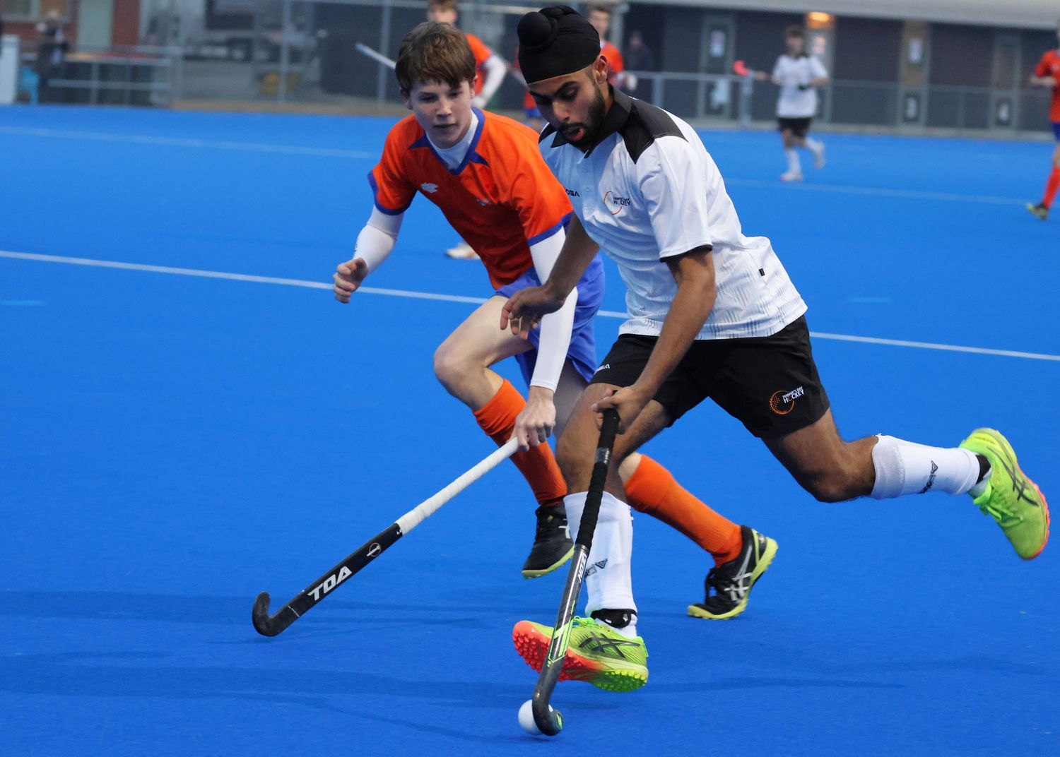 Hawke's Bay U18 Hockey Player dribbling the hockey ball.