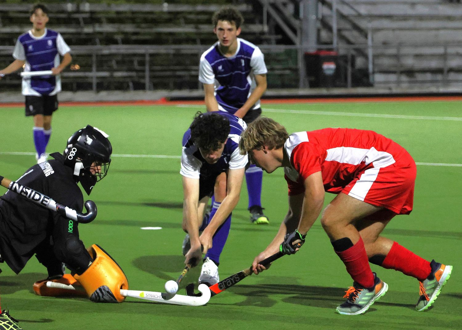 Lindisfarne College and Havelock North High School fighting to score in the weekly hockey competition in 2025