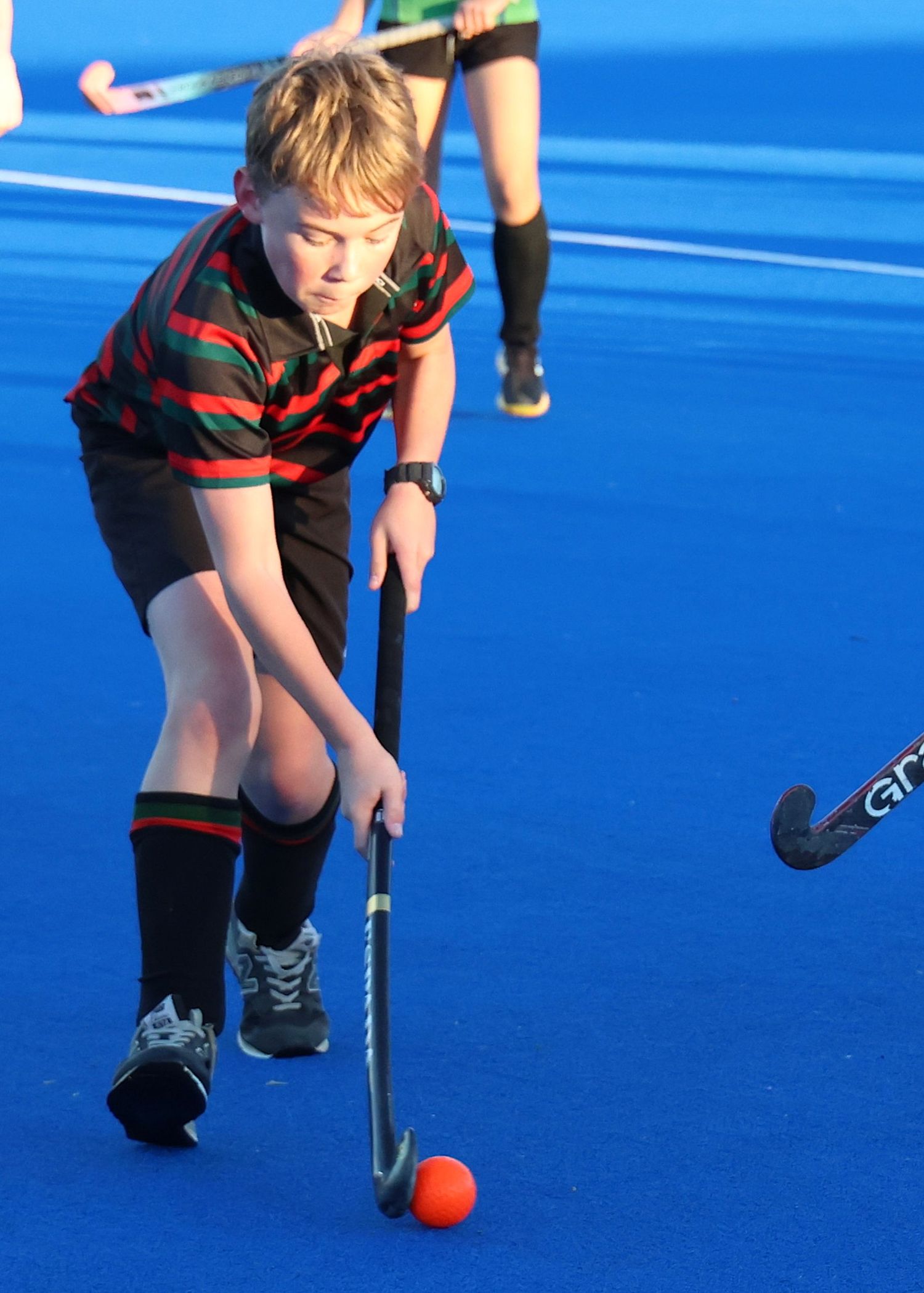 Hereworth School is an independent school in Havelock North, New Zealand. Hereworth School hockey player attacking orange ball.