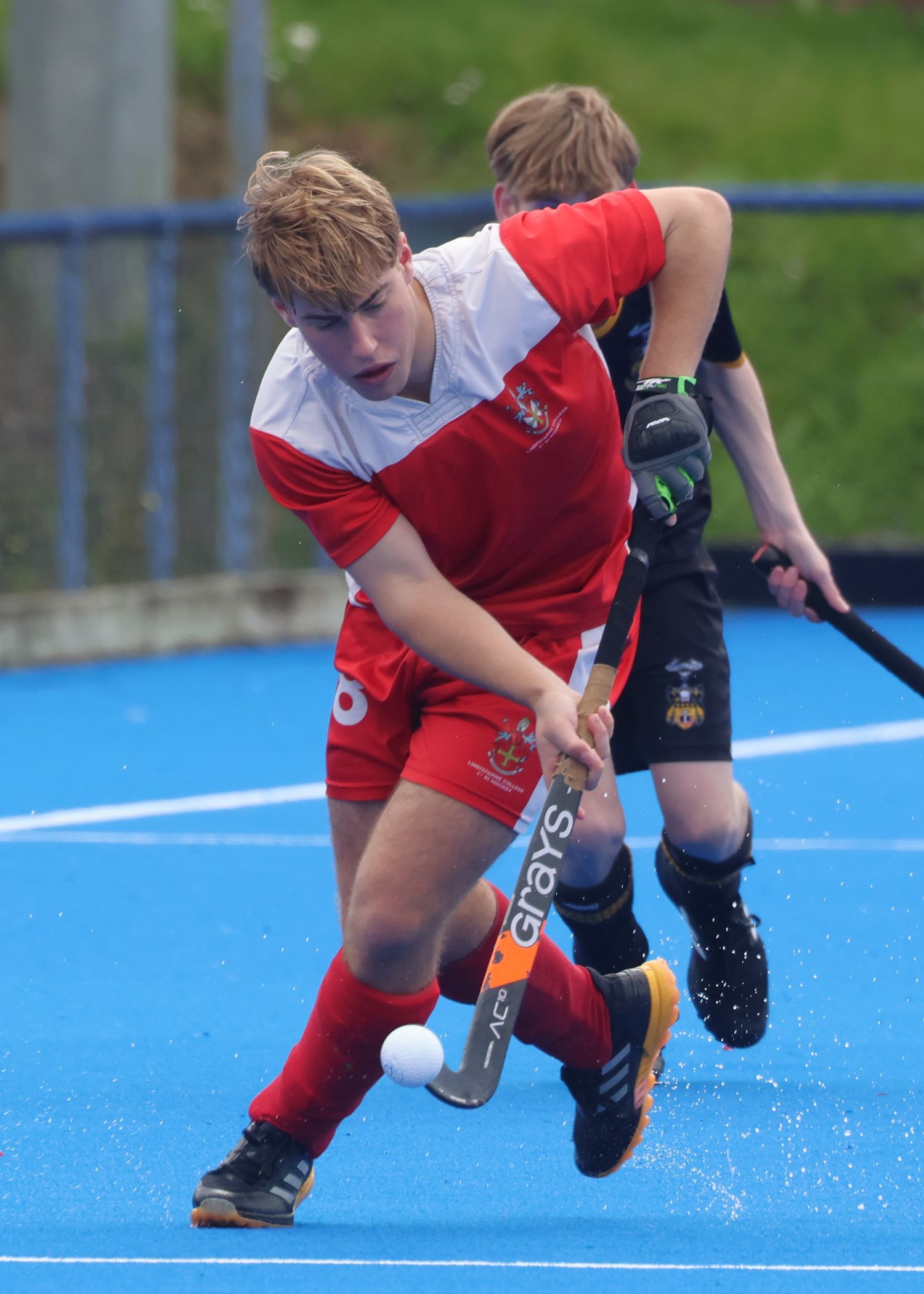 Lindisfarne College player performing 3d aerial hockey 
skills
