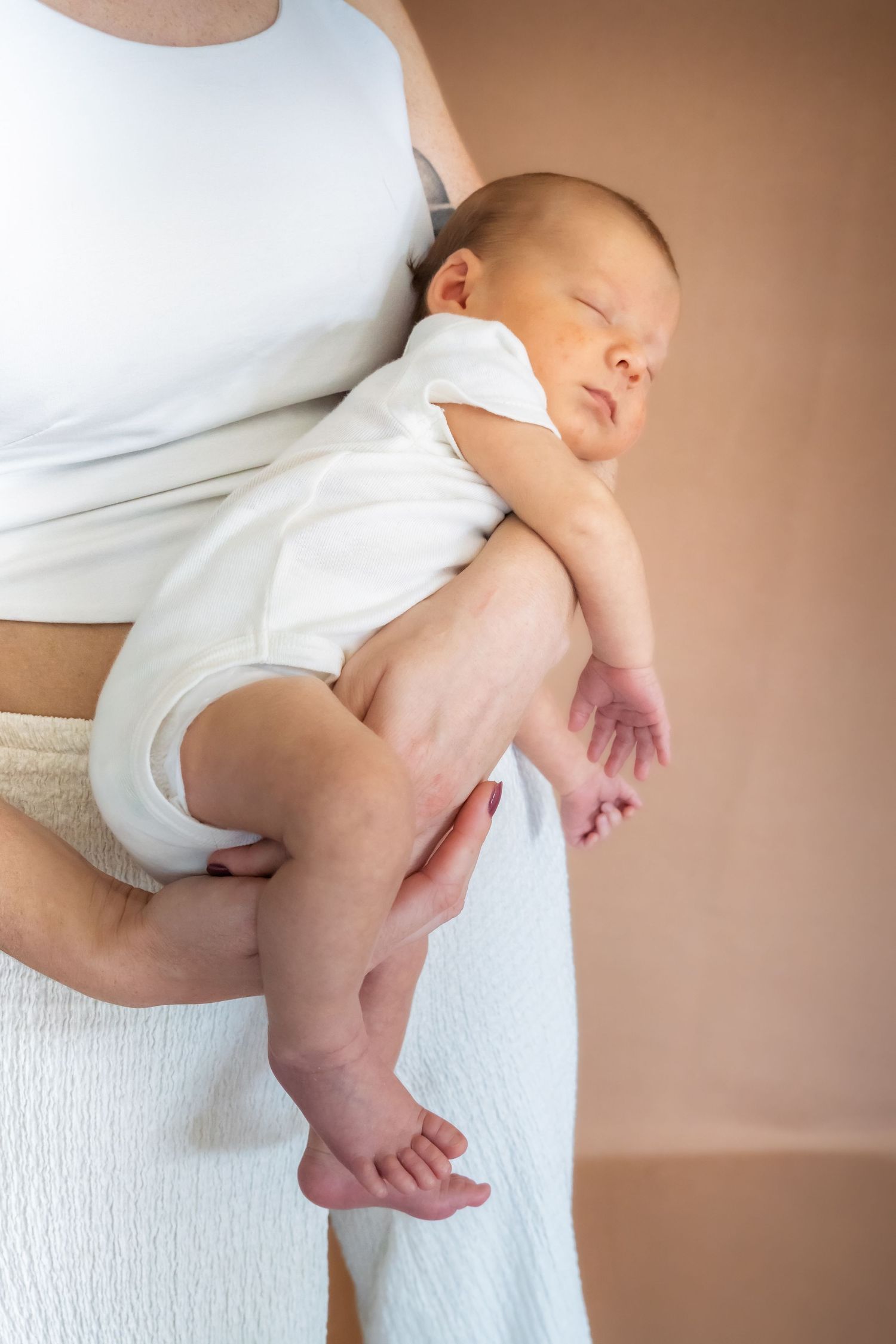 Photographie d'une famille & Nouveau-né pris par Horizon Studio - Photographie à Schleithal en Alsace.