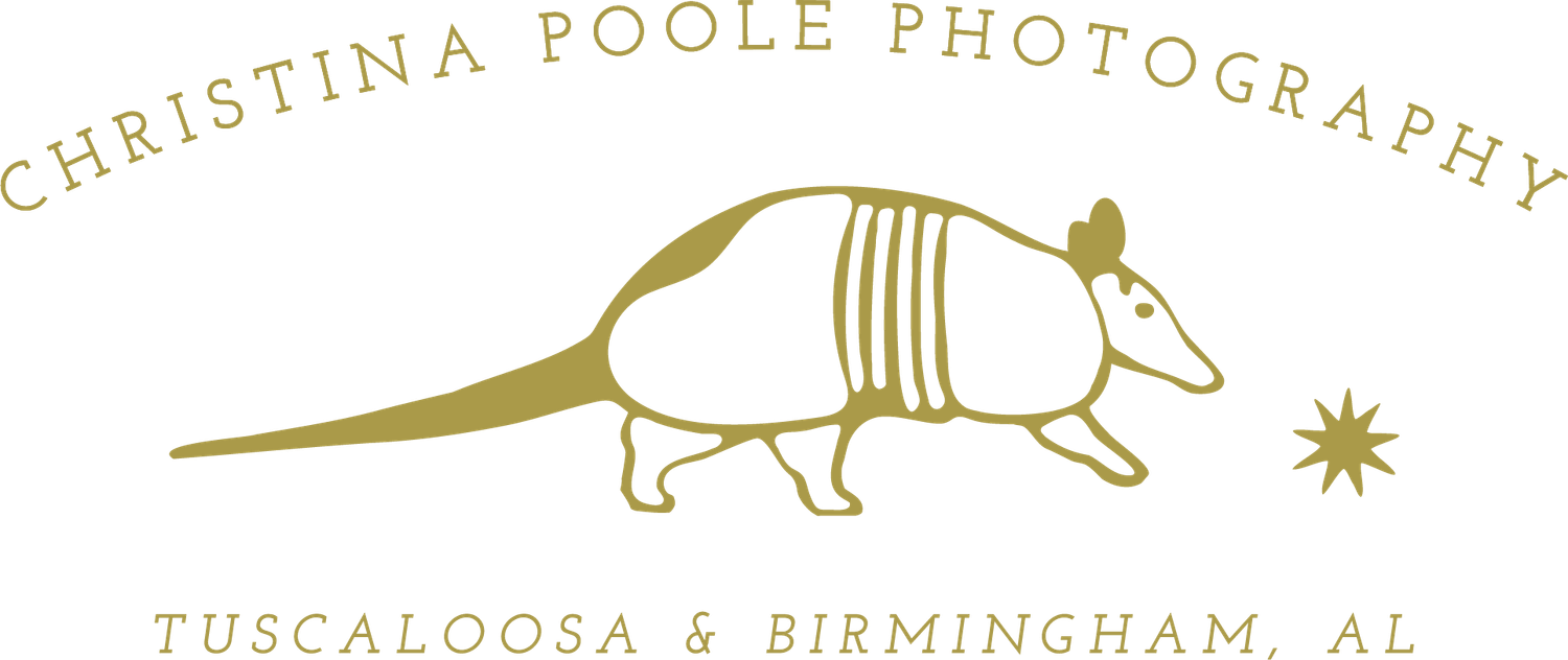 Christina Poole Photography gold armadillo logo for Tuscaloosa and Birmingham, Alabama photography studio.