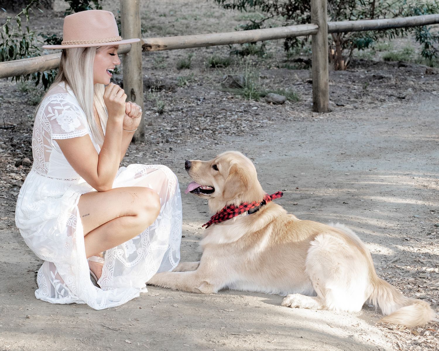Woman with her Golden Retriever during an outdoor portrait session in San Diego by Shadowcatcher Imagery