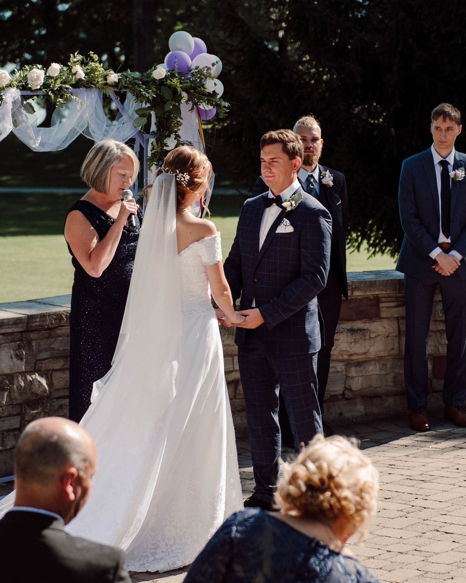A wedding Ceremony in front of the lake at Paletta Mansion