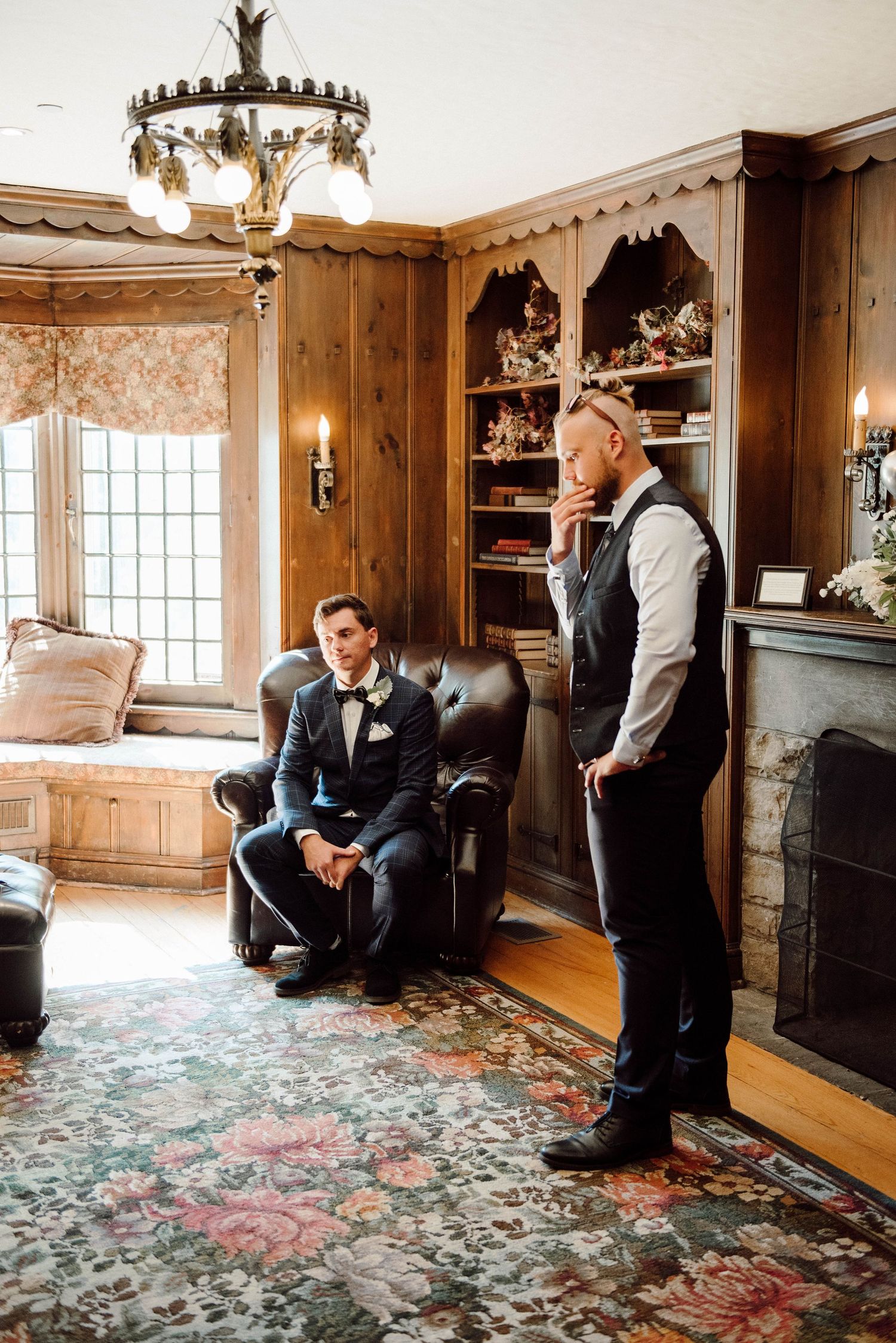 The groom and his best man waiting in the groom suite at Paletta Mansion