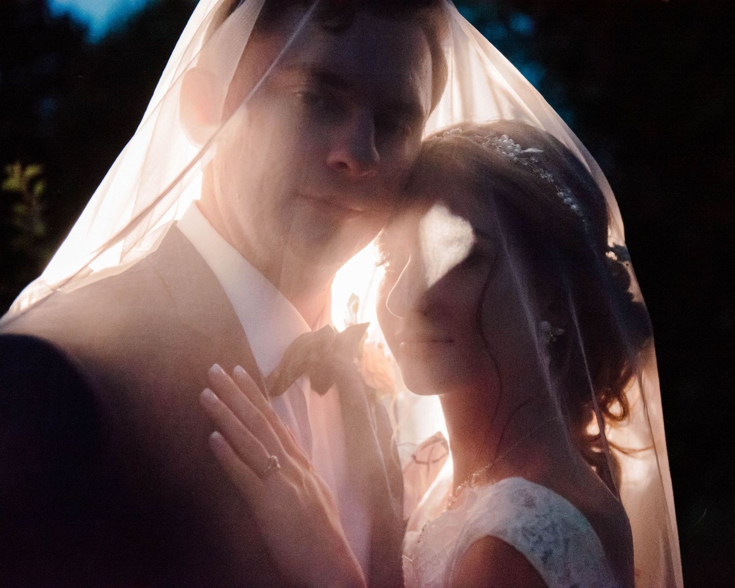 A night portrait of the bride and groom at Paletta Mansion