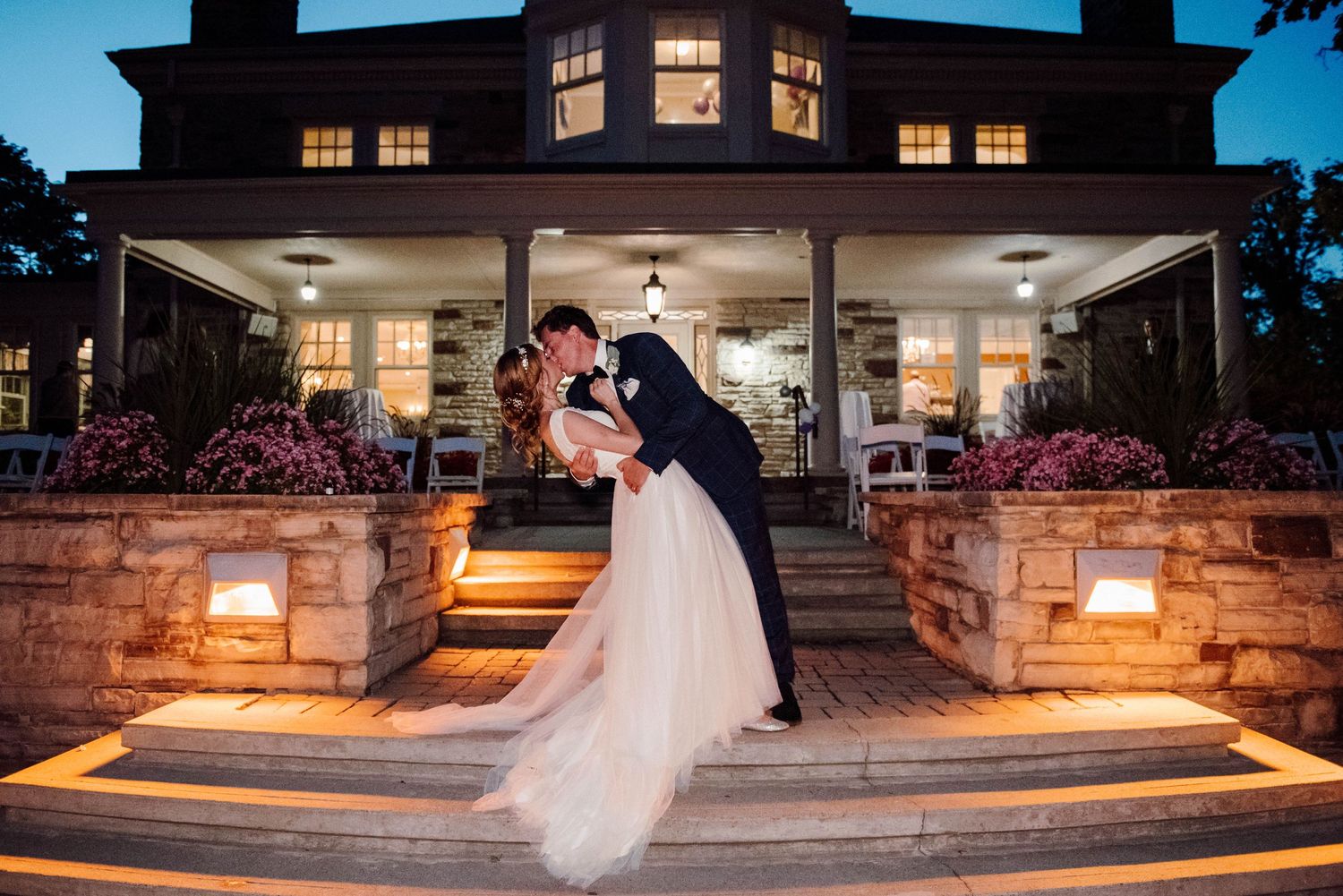 Bride and Groom dipping and kissing at Paletta Mansion