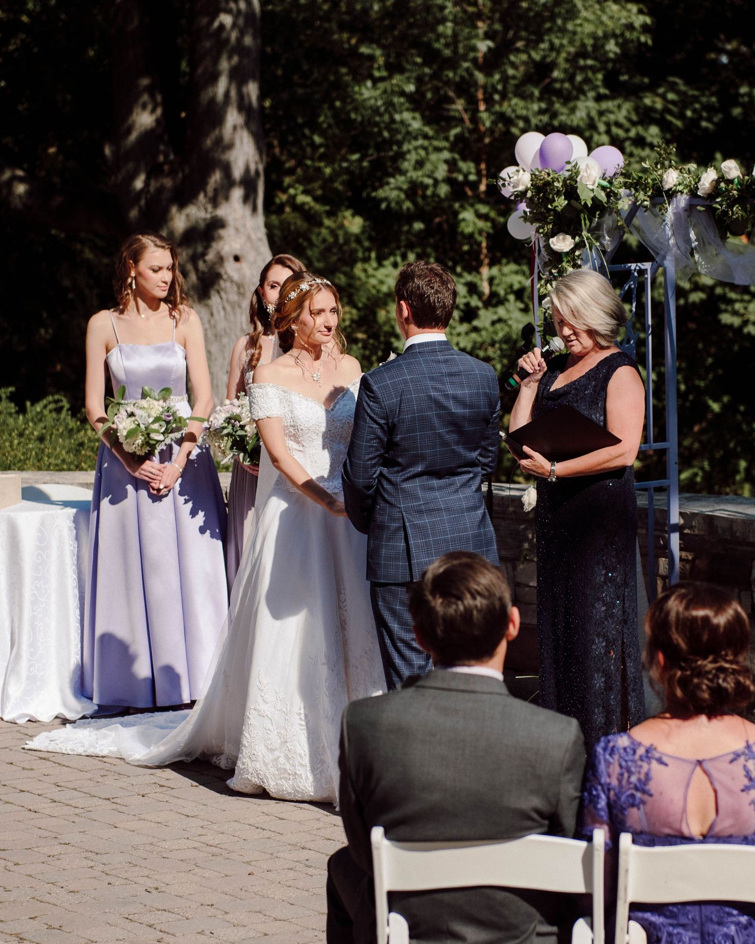 A wedding Ceremony in front of the lake at Paletta Mansion