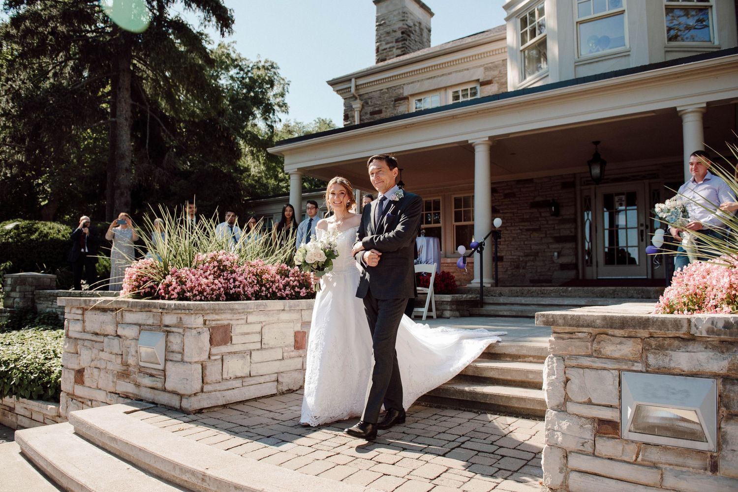 The bride and her father walking down the aisle at Paletta Mansion
