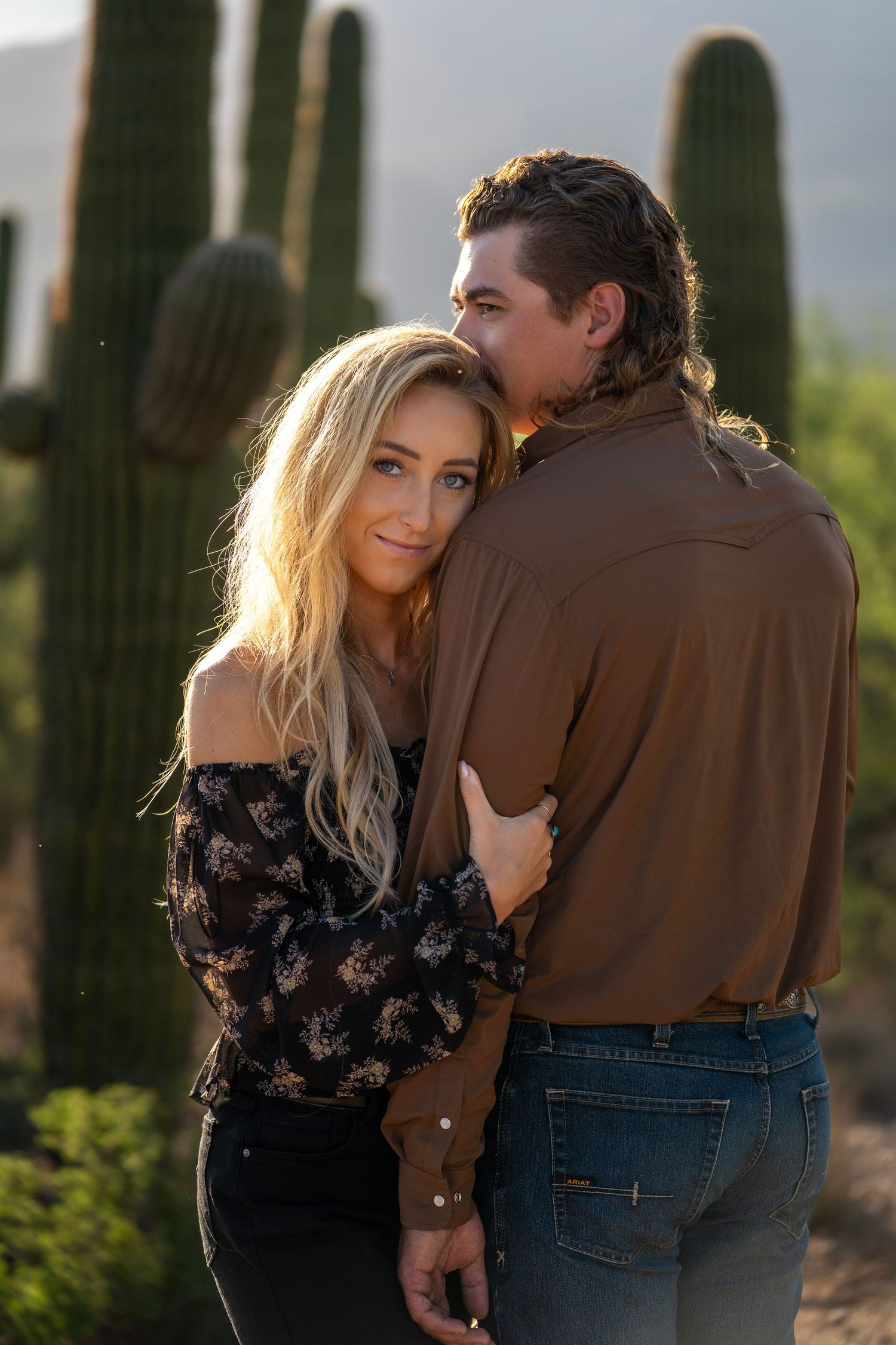 couple holding each other.