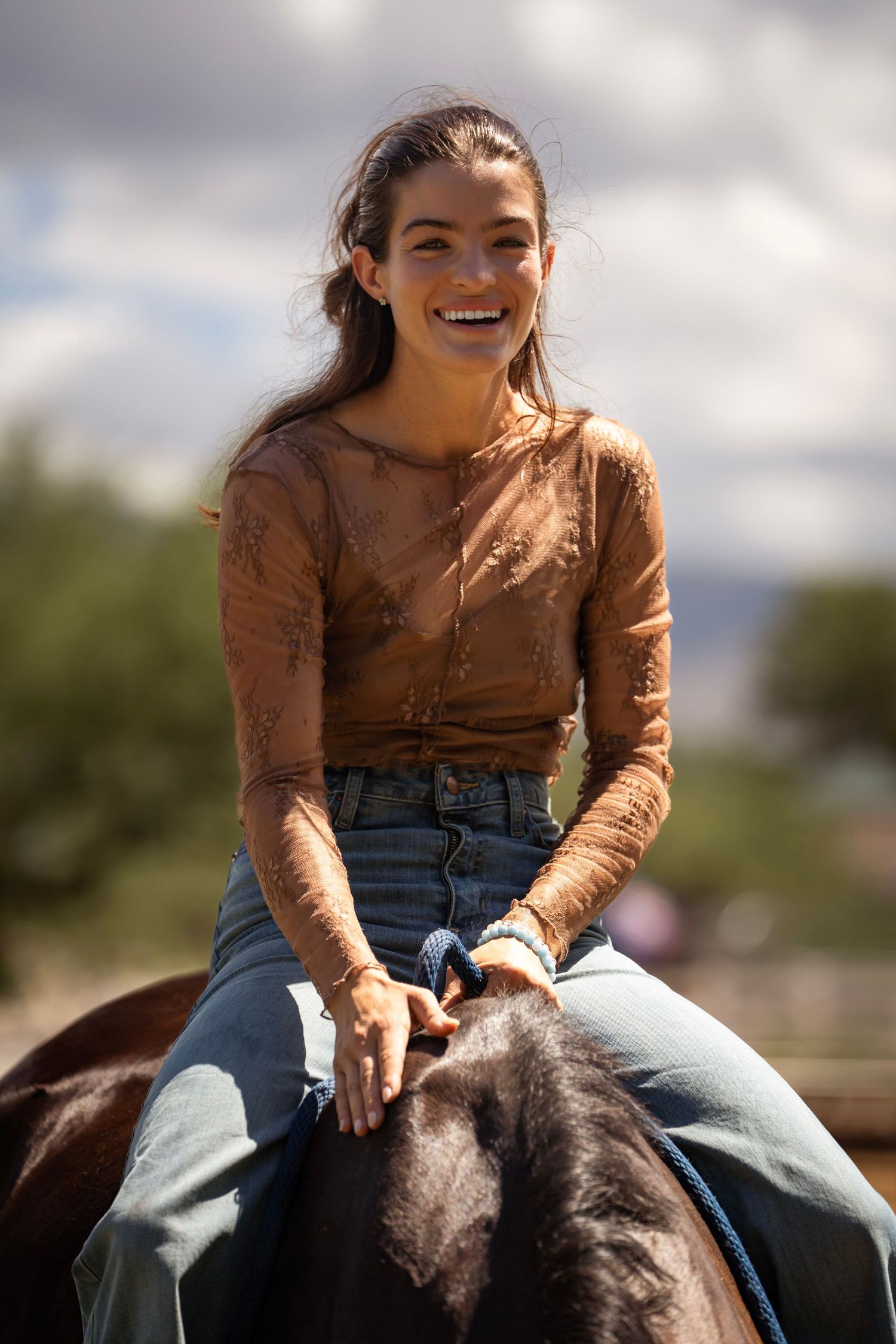 Girl sitting on horse bareback photoshoot