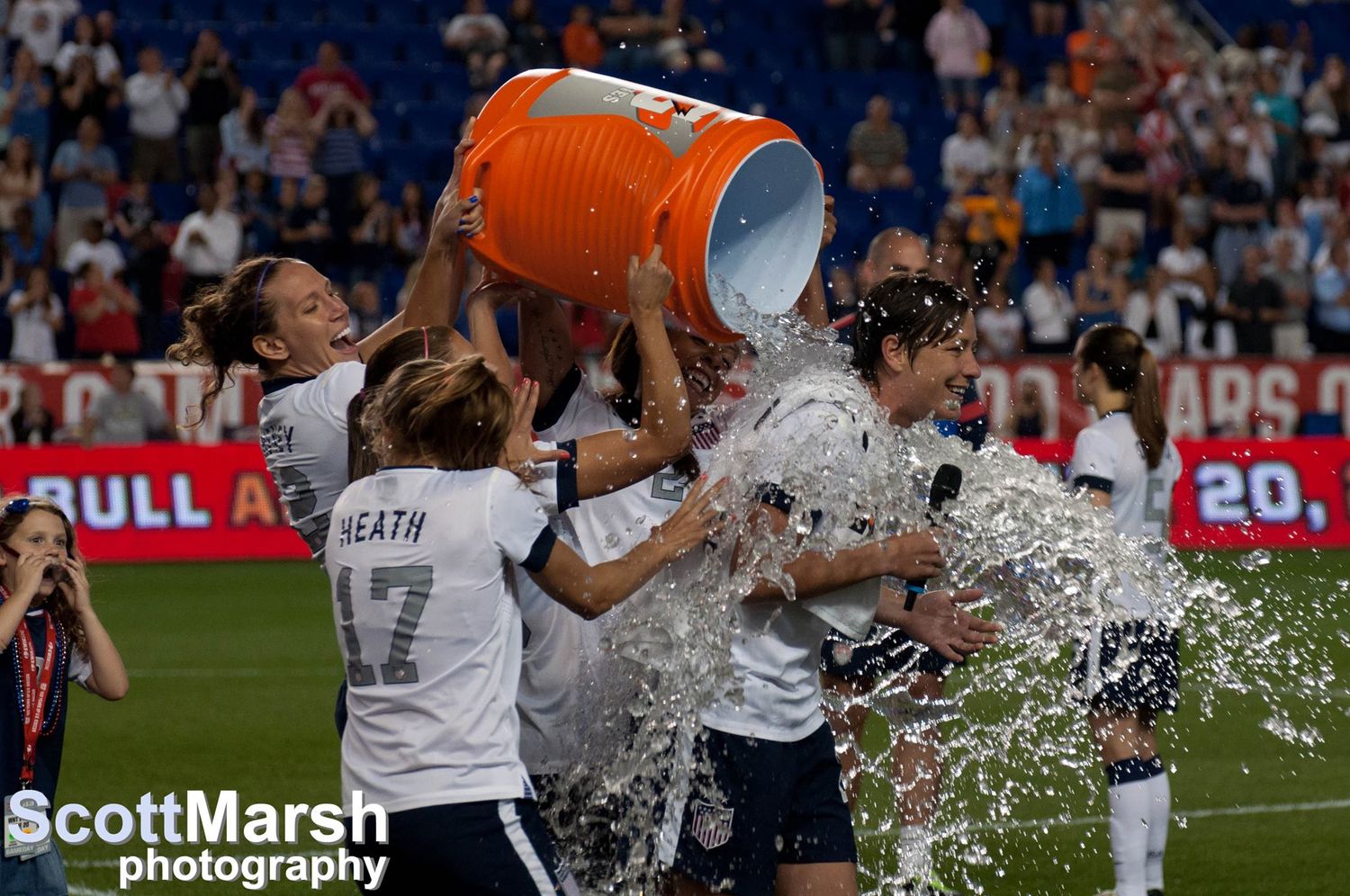 USA womens all time goal scorer, Abby Wambach gets a celebratory splash from her teammates