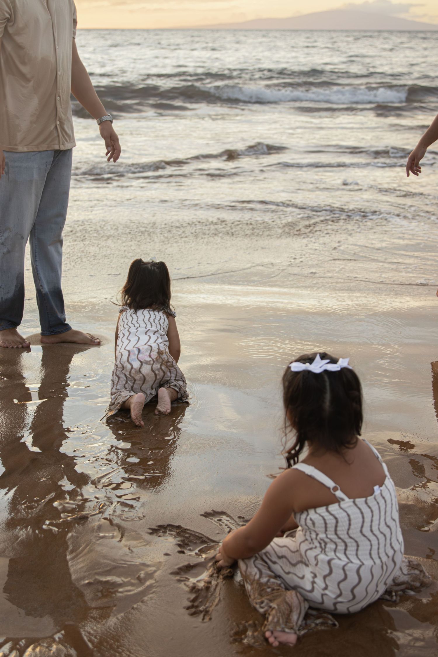 family photoshoot on a beach in maui